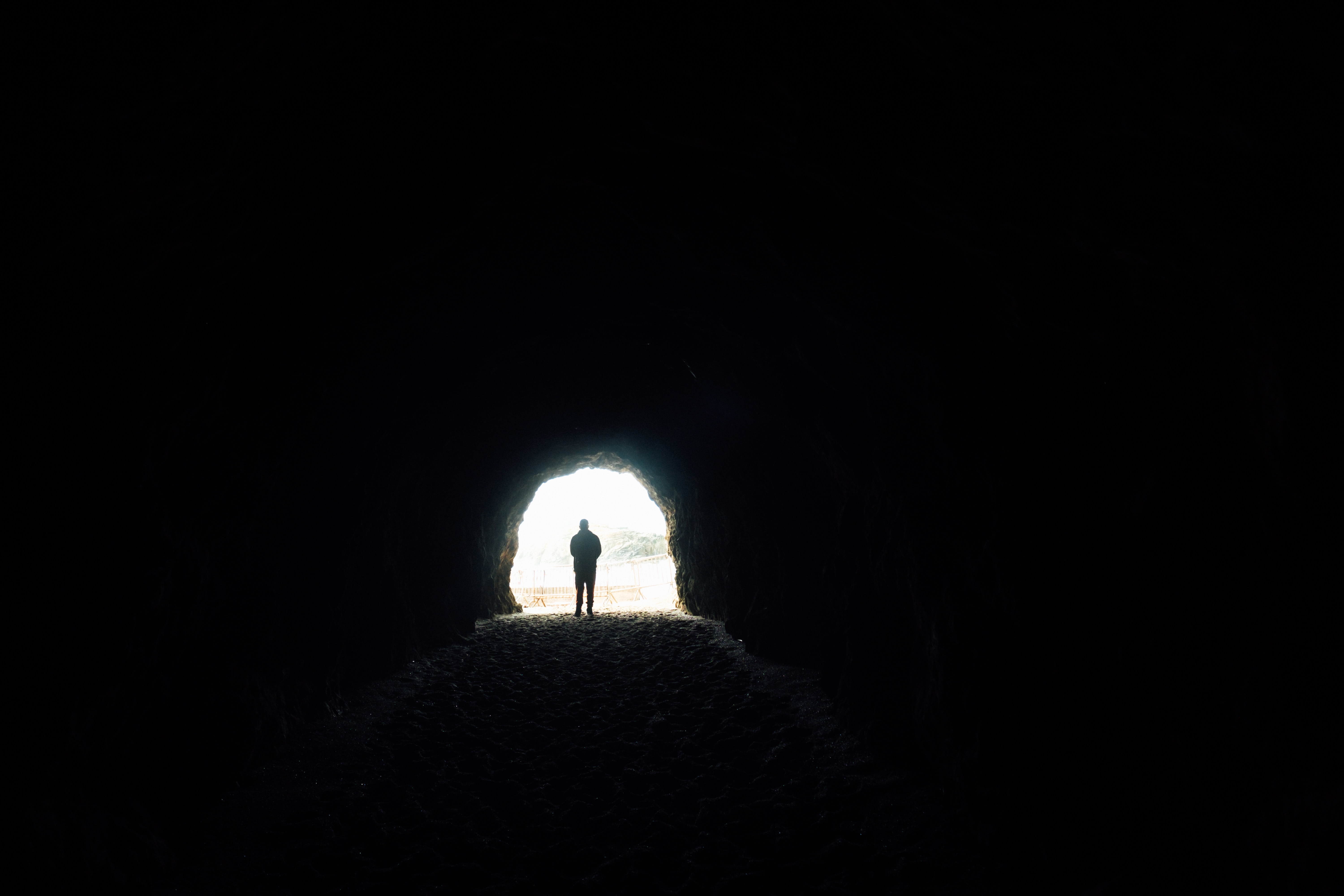 Download mobile wallpaper Cave, Silhouette, Loneliness, Dark for free.