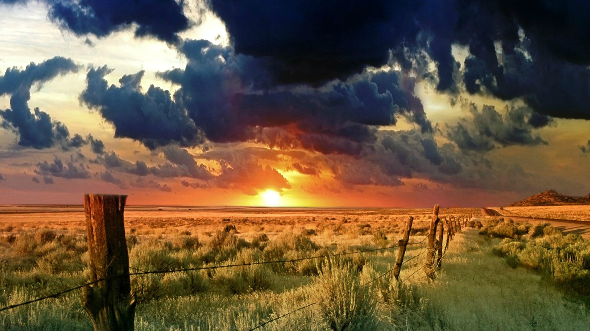 Download mobile wallpaper Sunset, Grass, Sky, Sun, Earth, Field, Fence, Cloud for free.