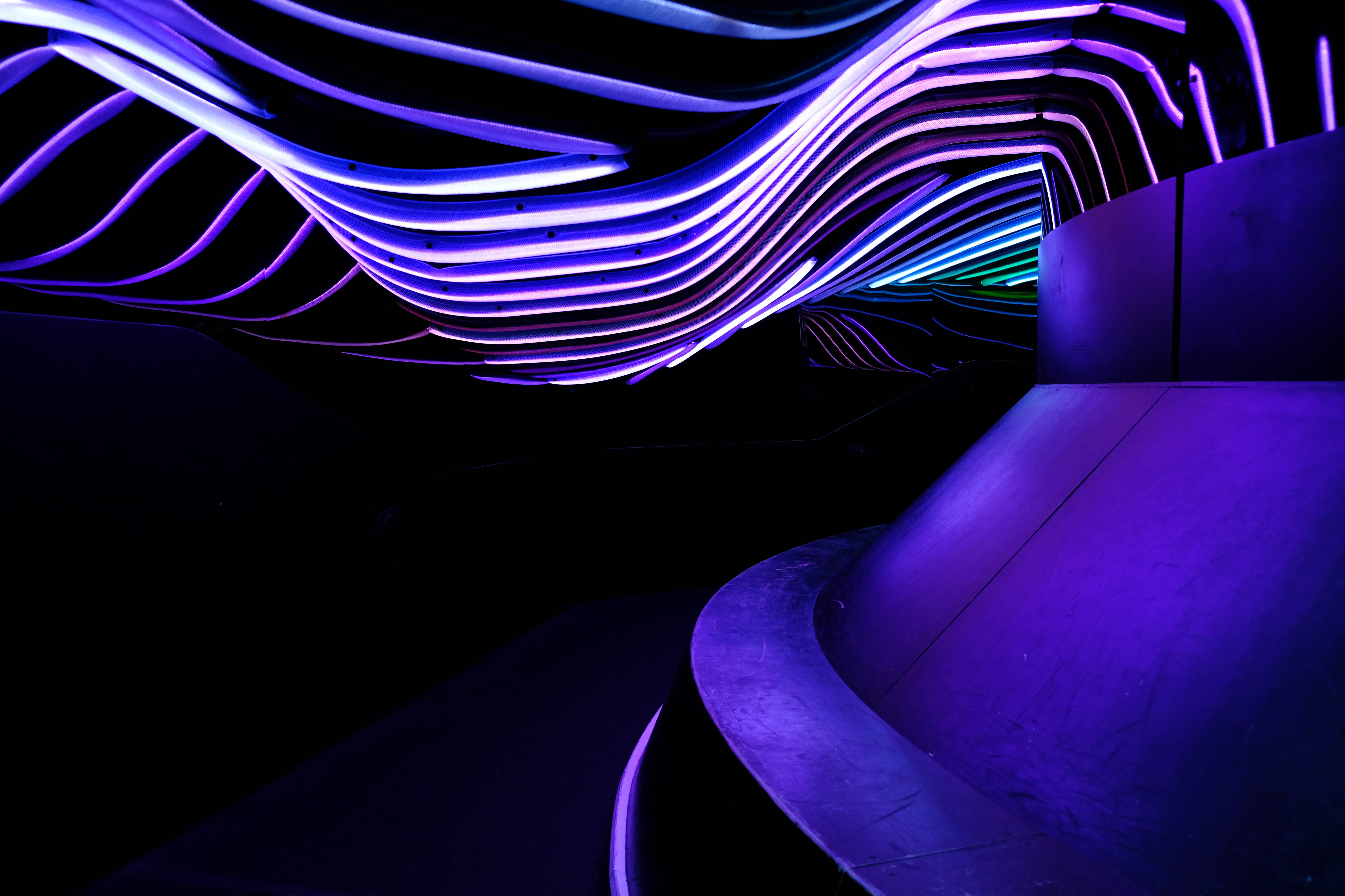 Download mobile wallpaper Tunnel, Wavy, Glow, Dark for free.