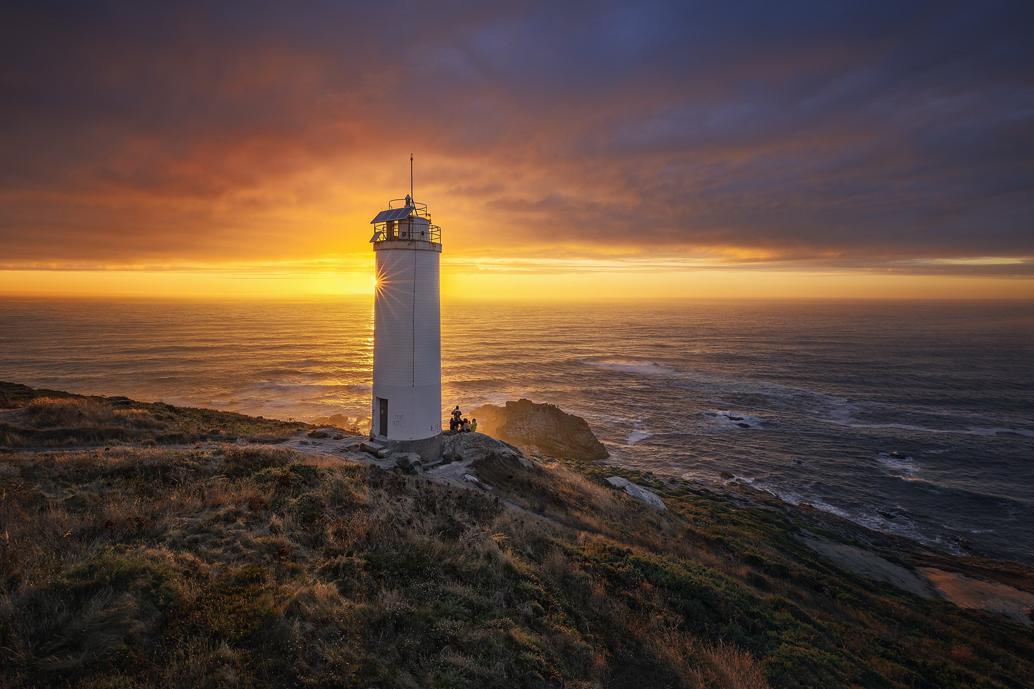 Free download wallpaper Sunset, Lighthouse, Man Made, Galicia on your PC desktop