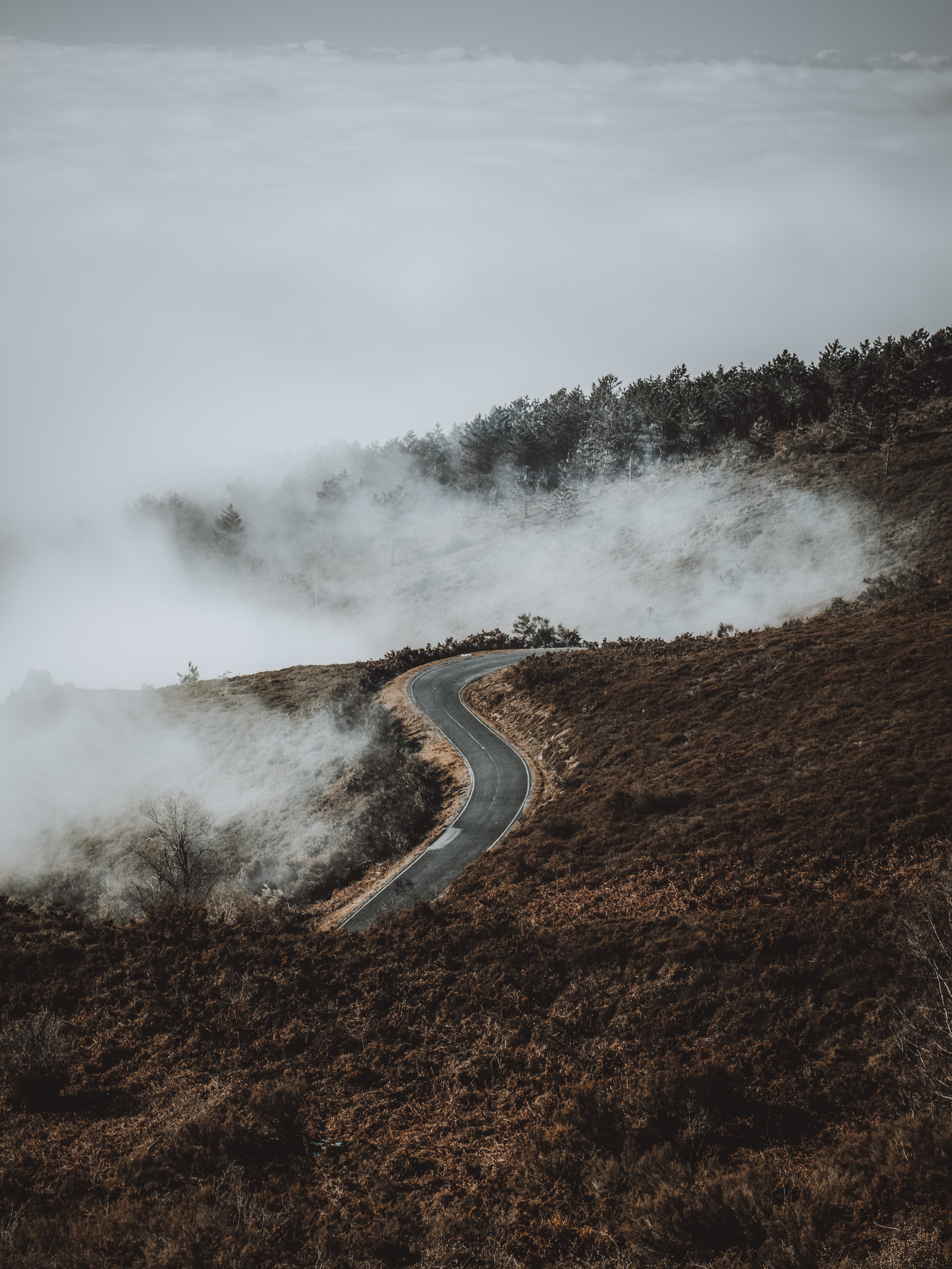 Download mobile wallpaper View From Above, Road, Hill, Clouds, Nature for free.