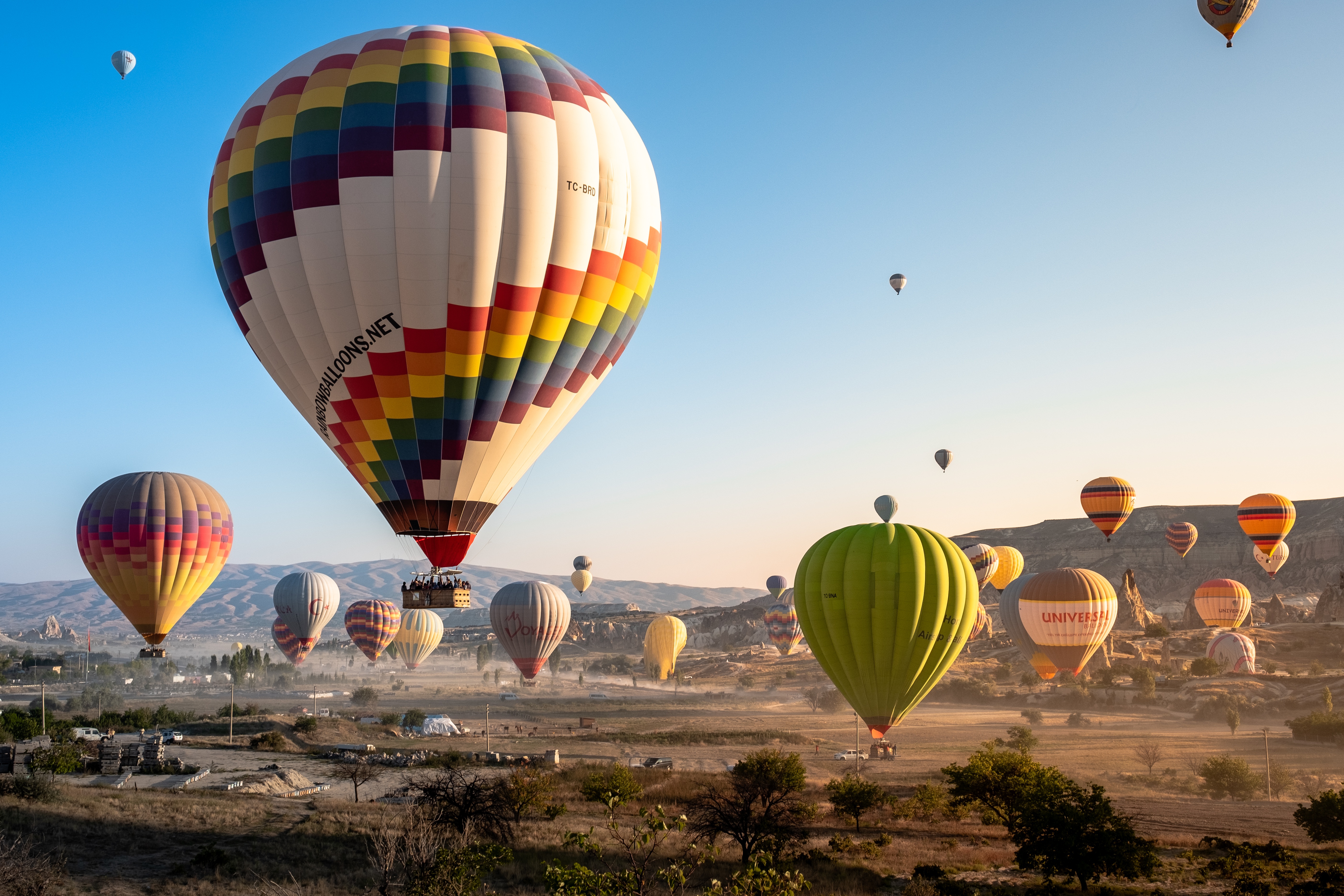 964078 скачать картинку каппадокия, воздушный шар, транспортные средства, рассвет, восход солнца - обои и заставки бесплатно