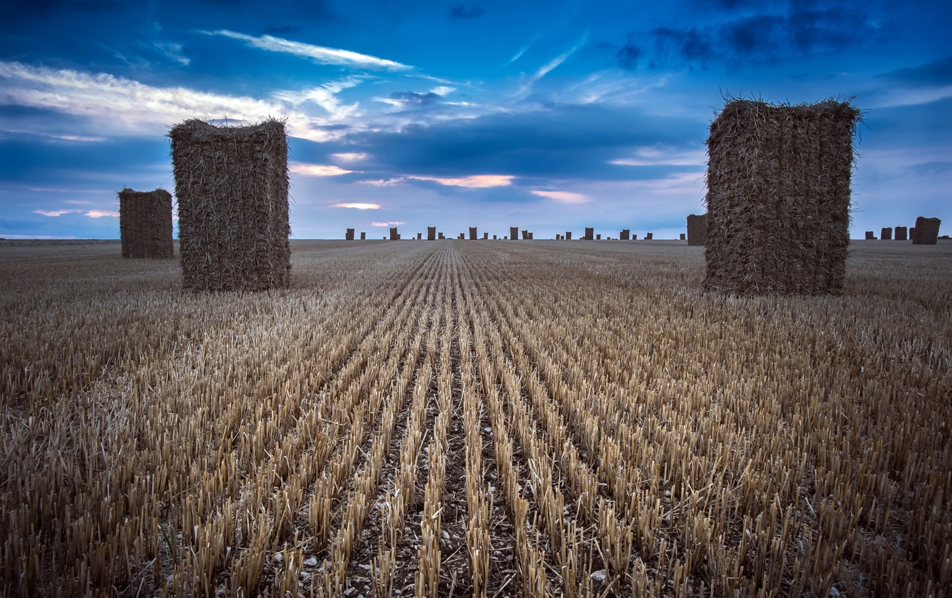 Download mobile wallpaper Nature, Sky, Summer, Earth, Field, Haystack for free.