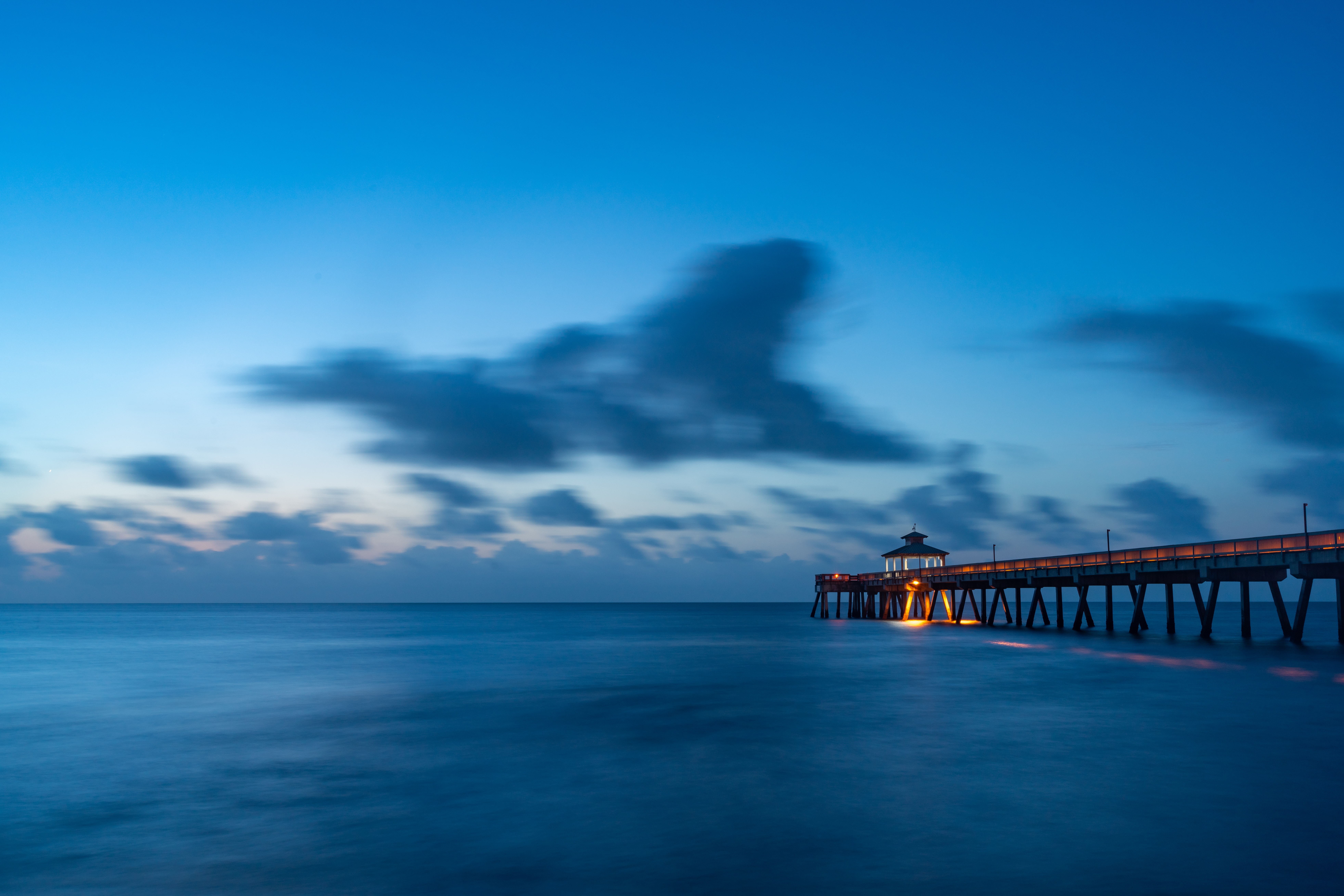 Download mobile wallpaper Clouds, Nature, Dusk, Twilight, Sea, Pier, Water for free.