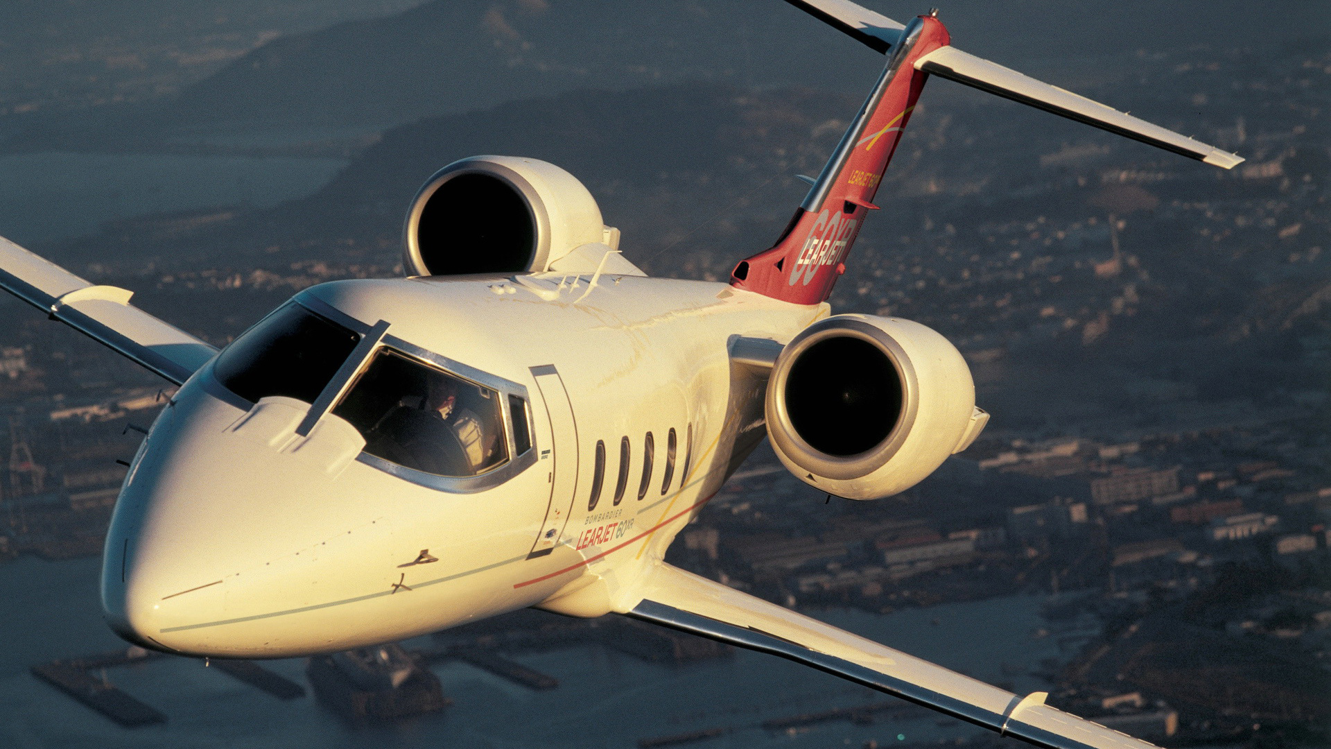 Download mobile wallpaper Airplane, Vehicles, Learjet 60Xr for free.