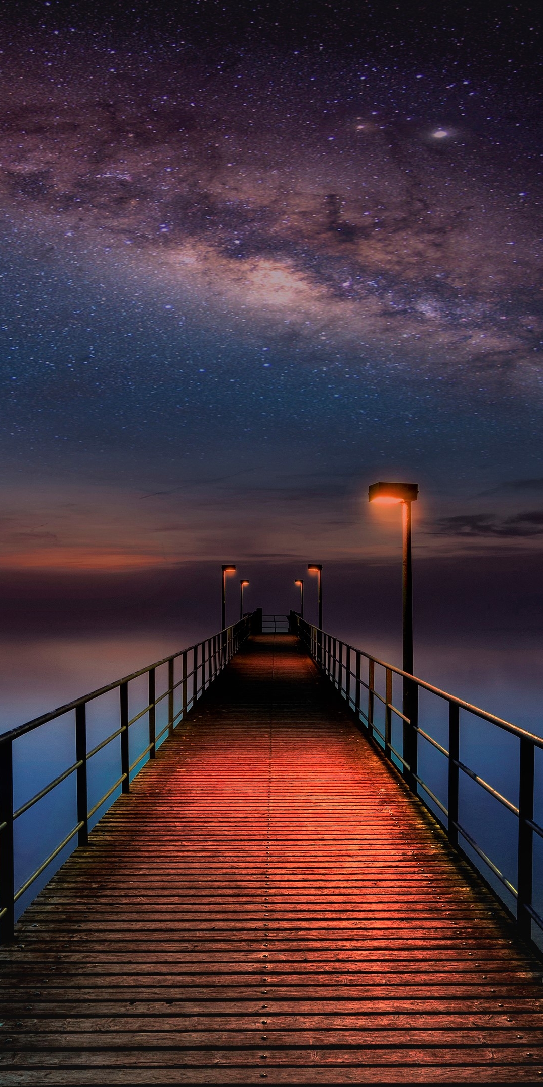 Download mobile wallpaper Sea, Stars, Night, Pier, Ocean, Starry Sky, Milky Way, Galaxy, Man Made for free.