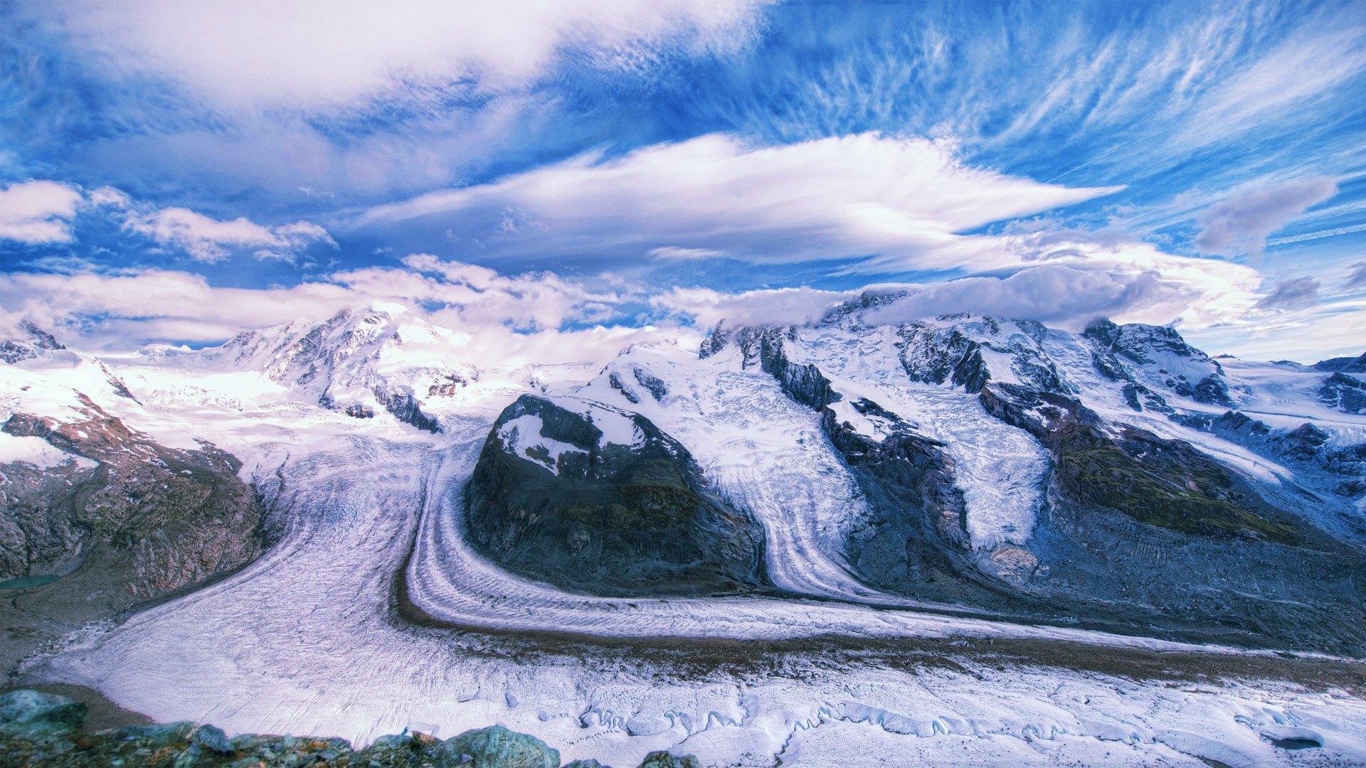 Download mobile wallpaper Landscape, Winter, Sky, Snow, Mountain, Earth, Switzerland, Cloud for free.
