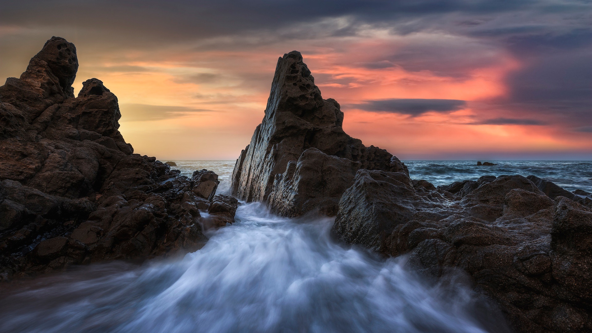 Free download wallpaper Sunset, Rock, Ocean, Earth on your PC desktop