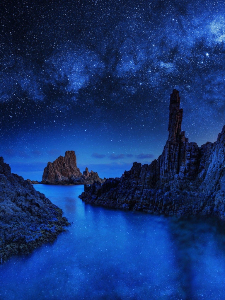 Download mobile wallpaper Nature, Sky, Night, Rock, Starry Sky, Earth for free.