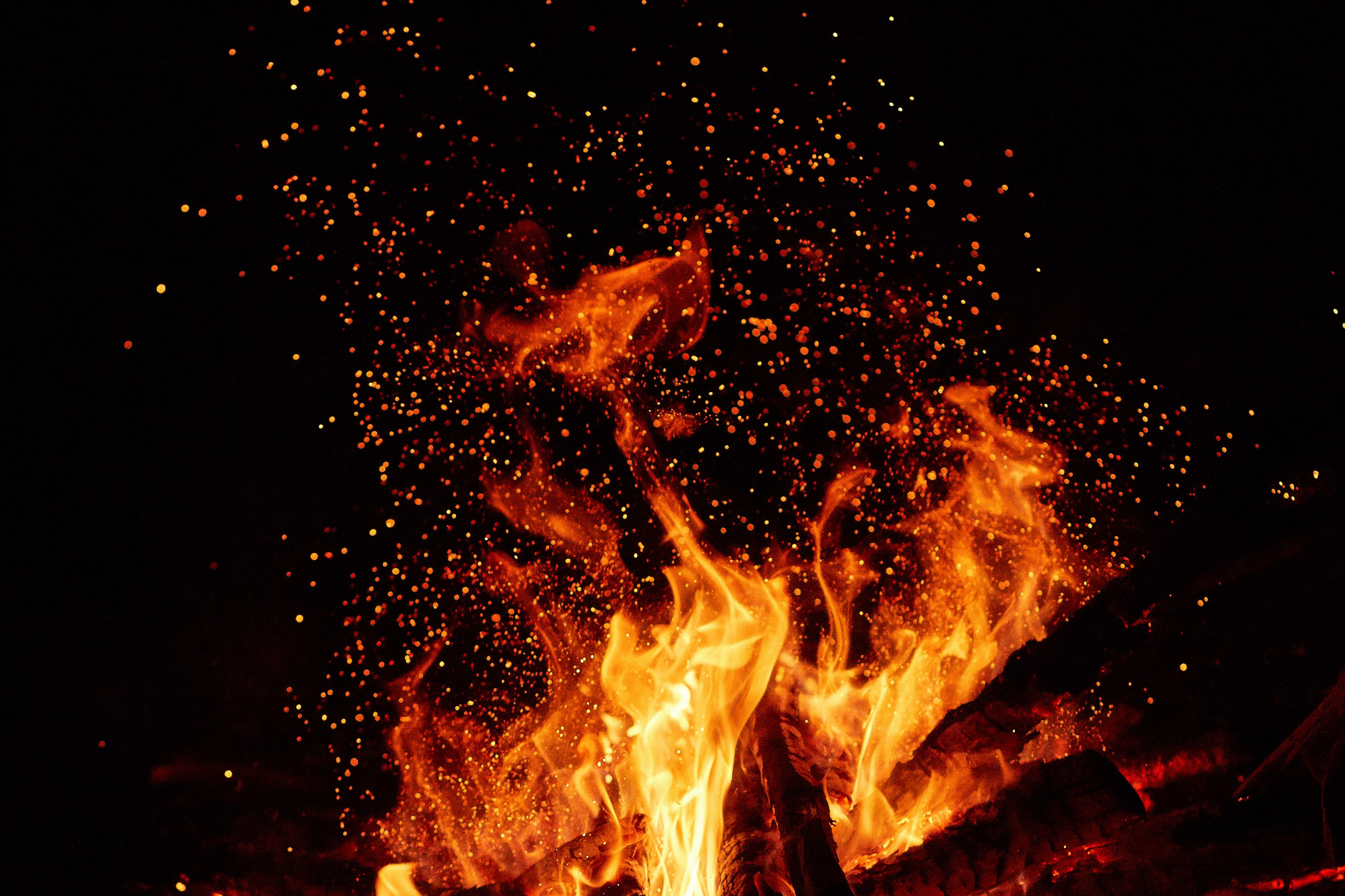 Download mobile wallpaper Glare, Sparks, Flame, Fire, Dark for free.