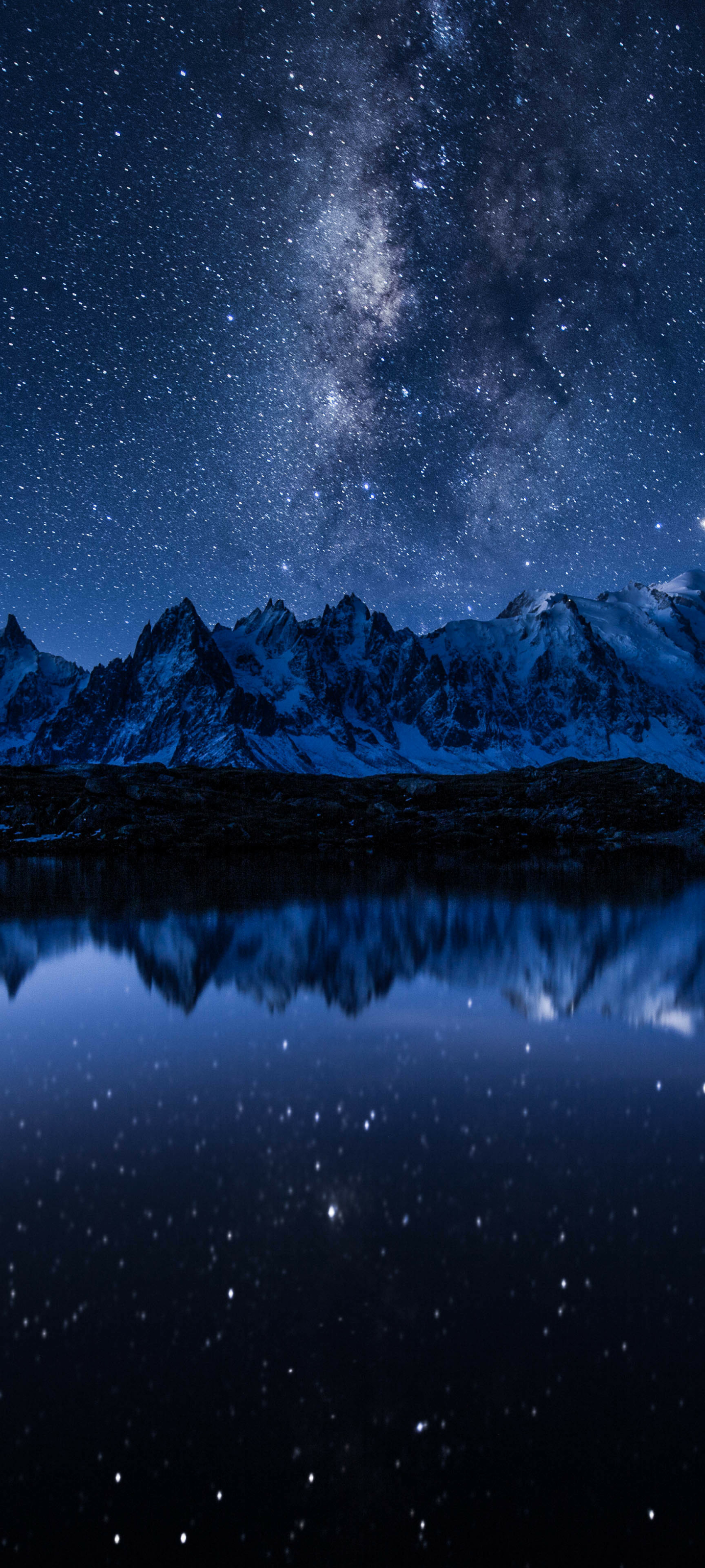 Download mobile wallpaper Nature, Water, Sky, Stars, Night, Mountain, Reflection, Earth, Milky Way for free.