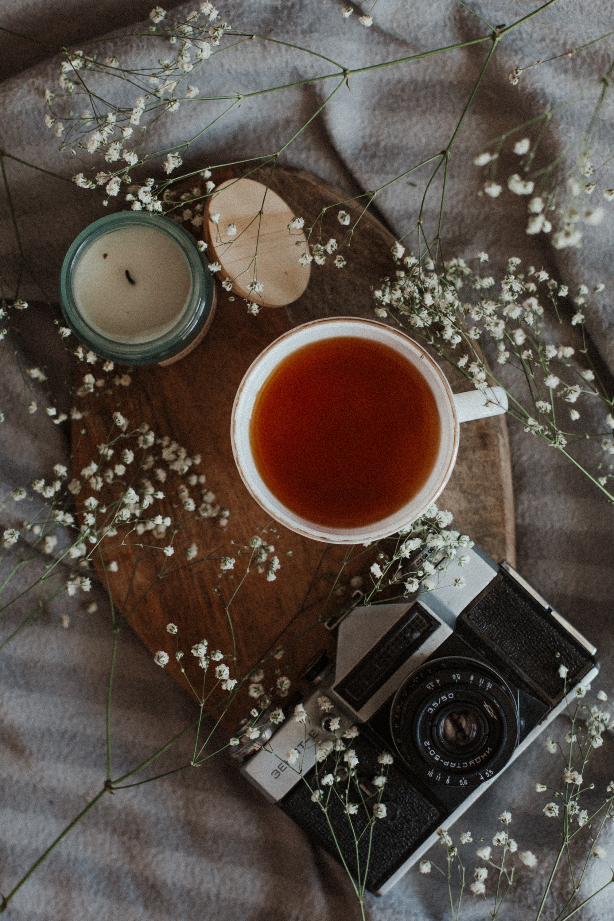 Free download wallpaper Flowers, Miscellanea, Miscellaneous, Candle, Mug, Cup, Camera, Still Life, Tea on your PC desktop