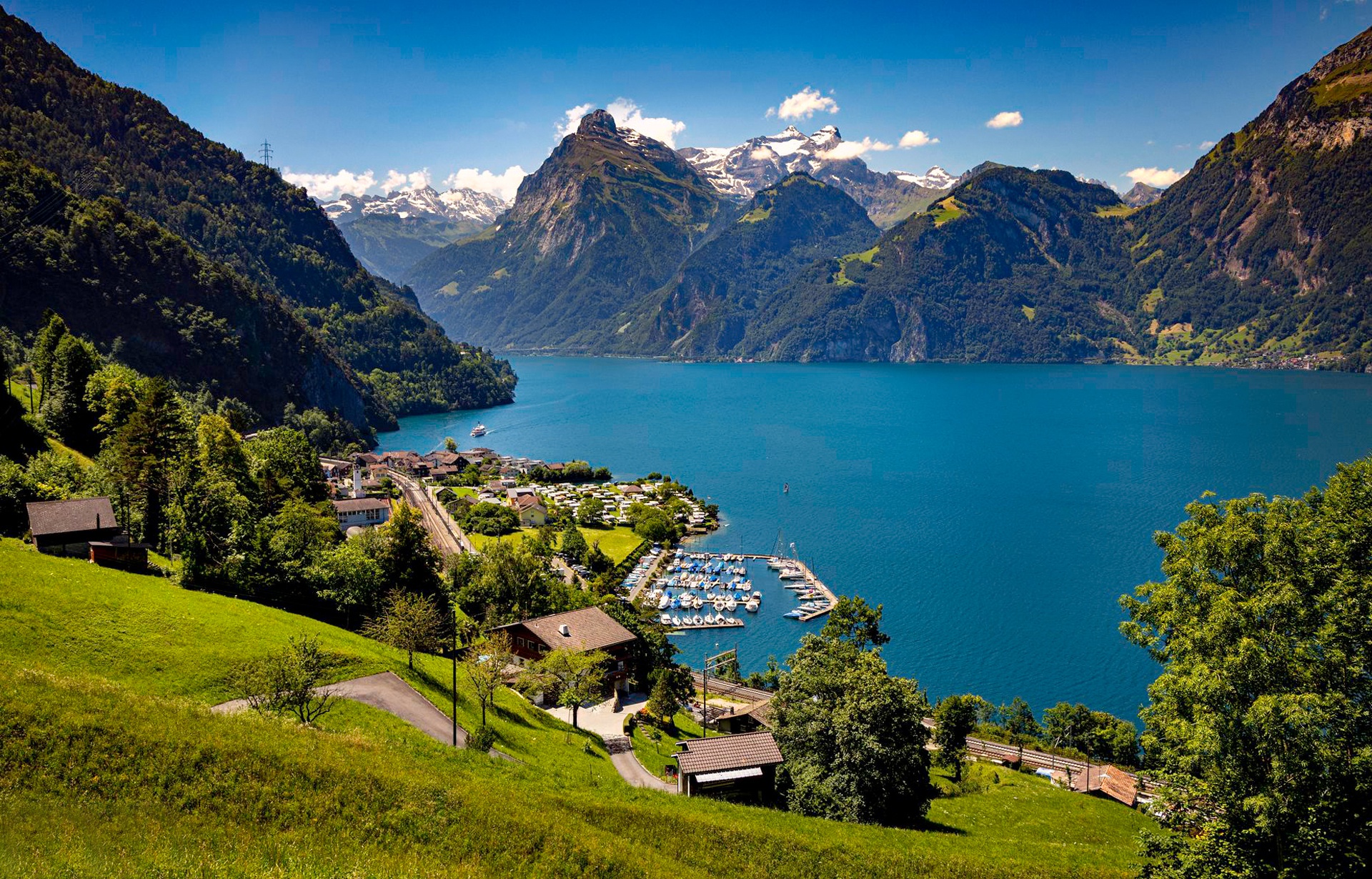 Download mobile wallpaper Mountain, Lake, Alps, Village, Switzerland, Panorama, Man Made for free.