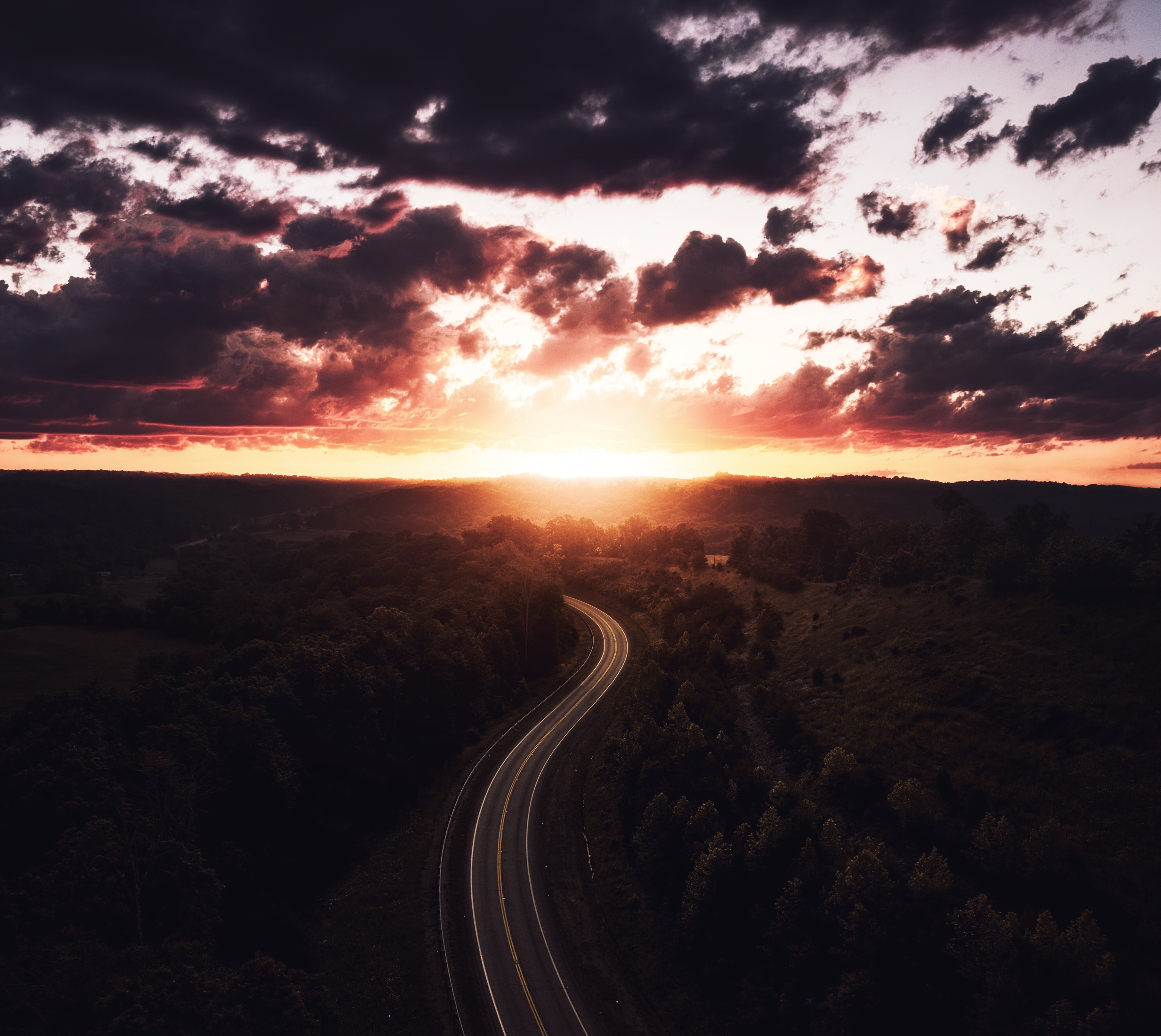 Download mobile wallpaper Trees, Nature, Road, Sky, Forest, View From Above, Sunset for free.