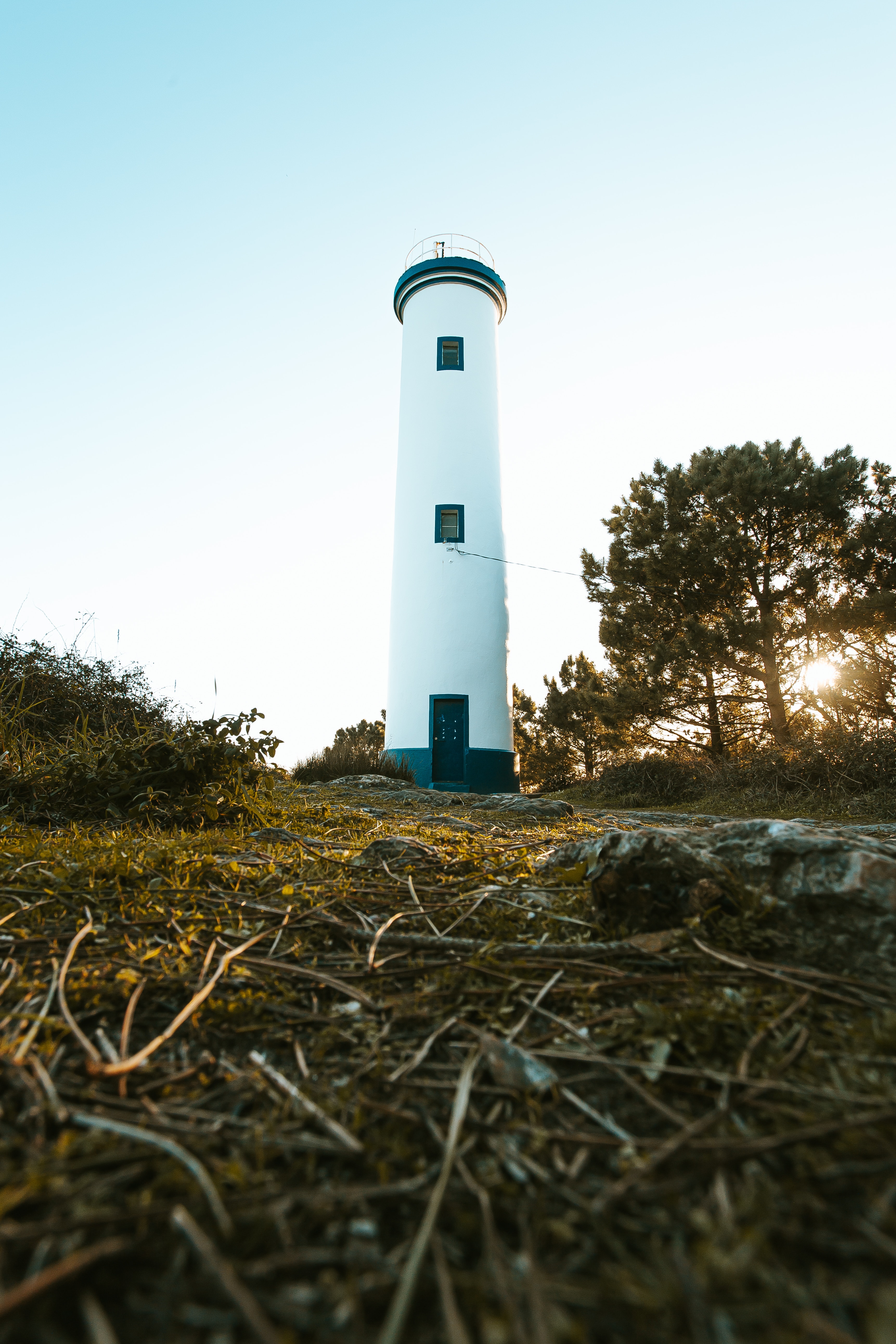 Free download wallpaper Nature, Trees, Building, Miscellanea, Miscellaneous, Lighthouse, Tower on your PC desktop