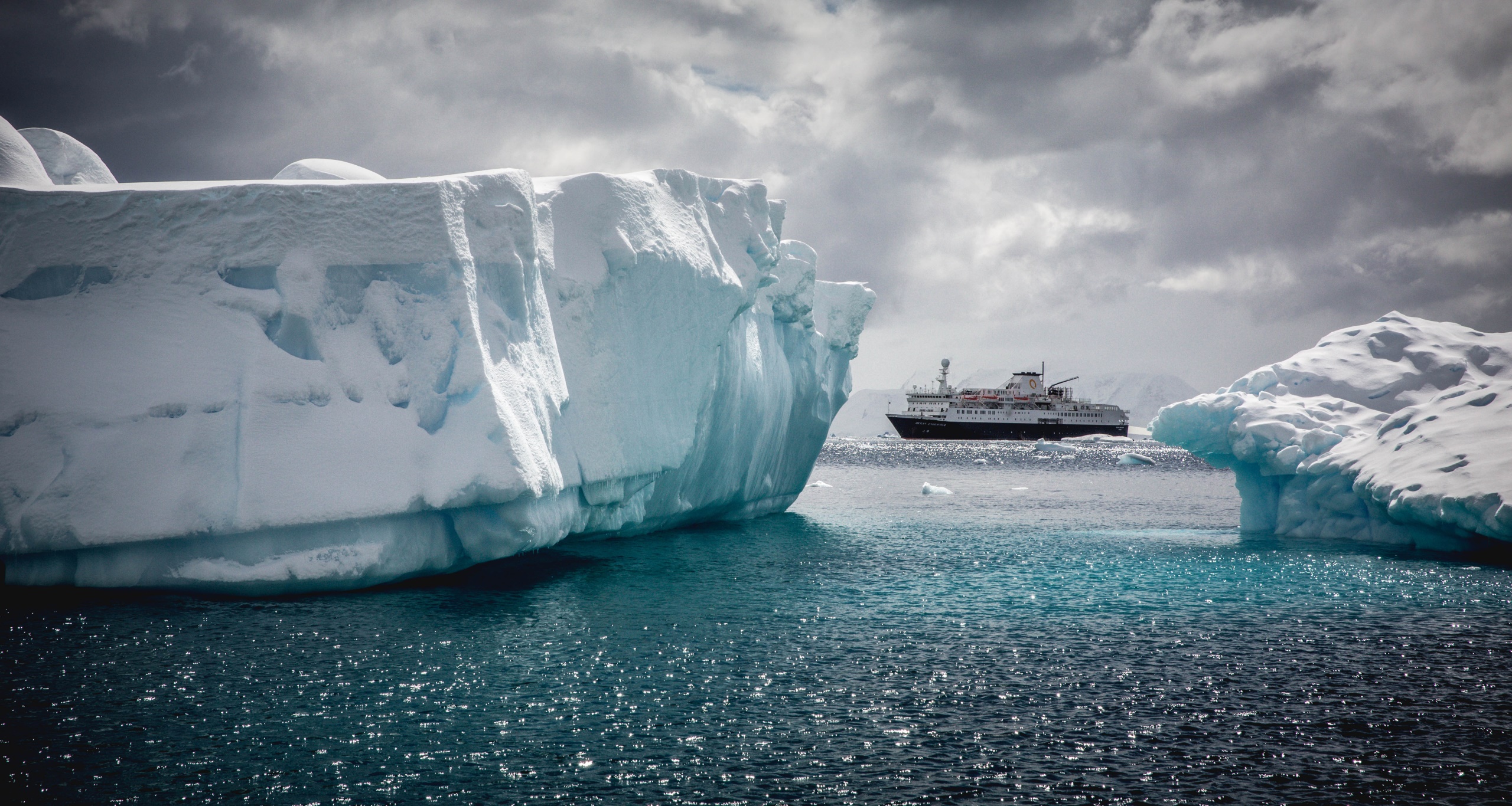 Download mobile wallpaper Water, Sea, Snow, Arctic, Ship, Cloud, Iceberg, Vehicles for free.