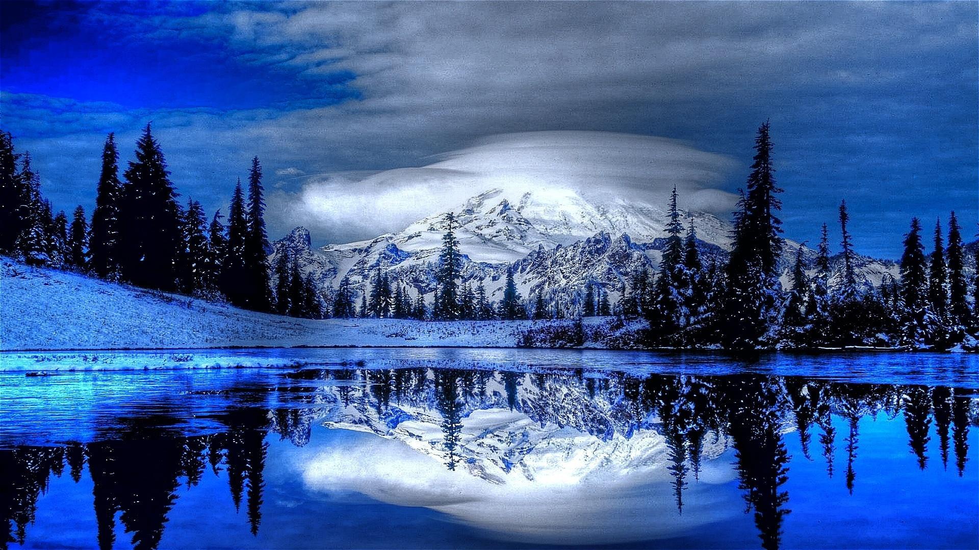 Скачать картинку Зима, Облака, Снег, Гора, Озеро, Отражение, Дерево, Ландшафт, Земля/природа в телефон бесплатно.
