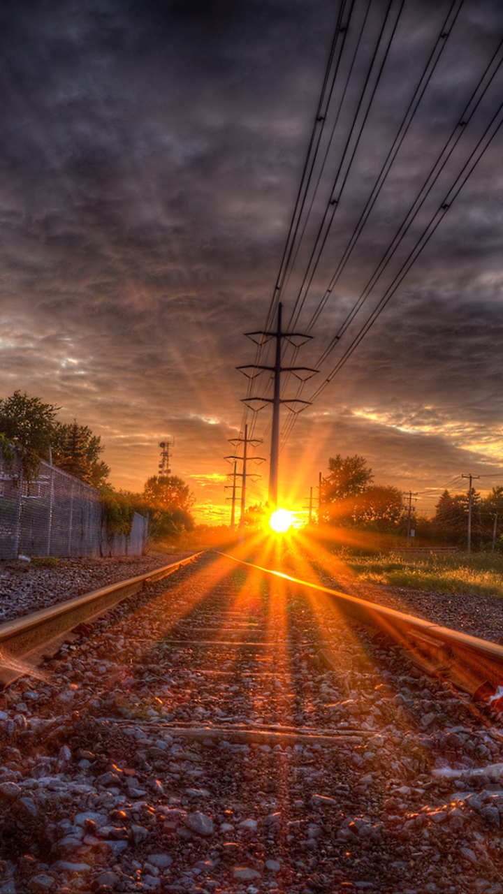 Download mobile wallpaper Sunset, Cloud, Photography, Railroad, Sunbeam, Power Line, Sunbean for free.