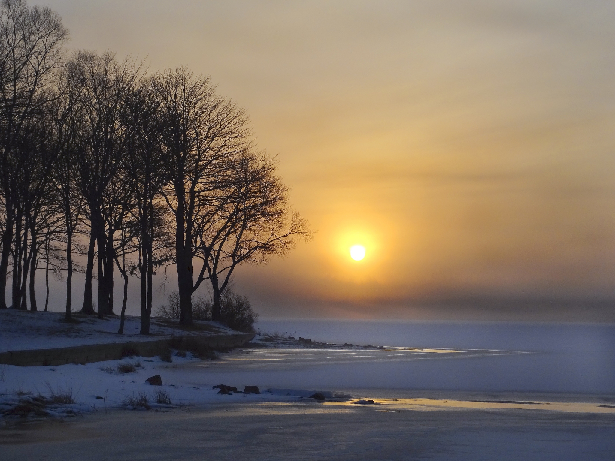 Download mobile wallpaper Lake, Winter, Ice, Dawn, Snow, Trees, Sun, Nature for free.
