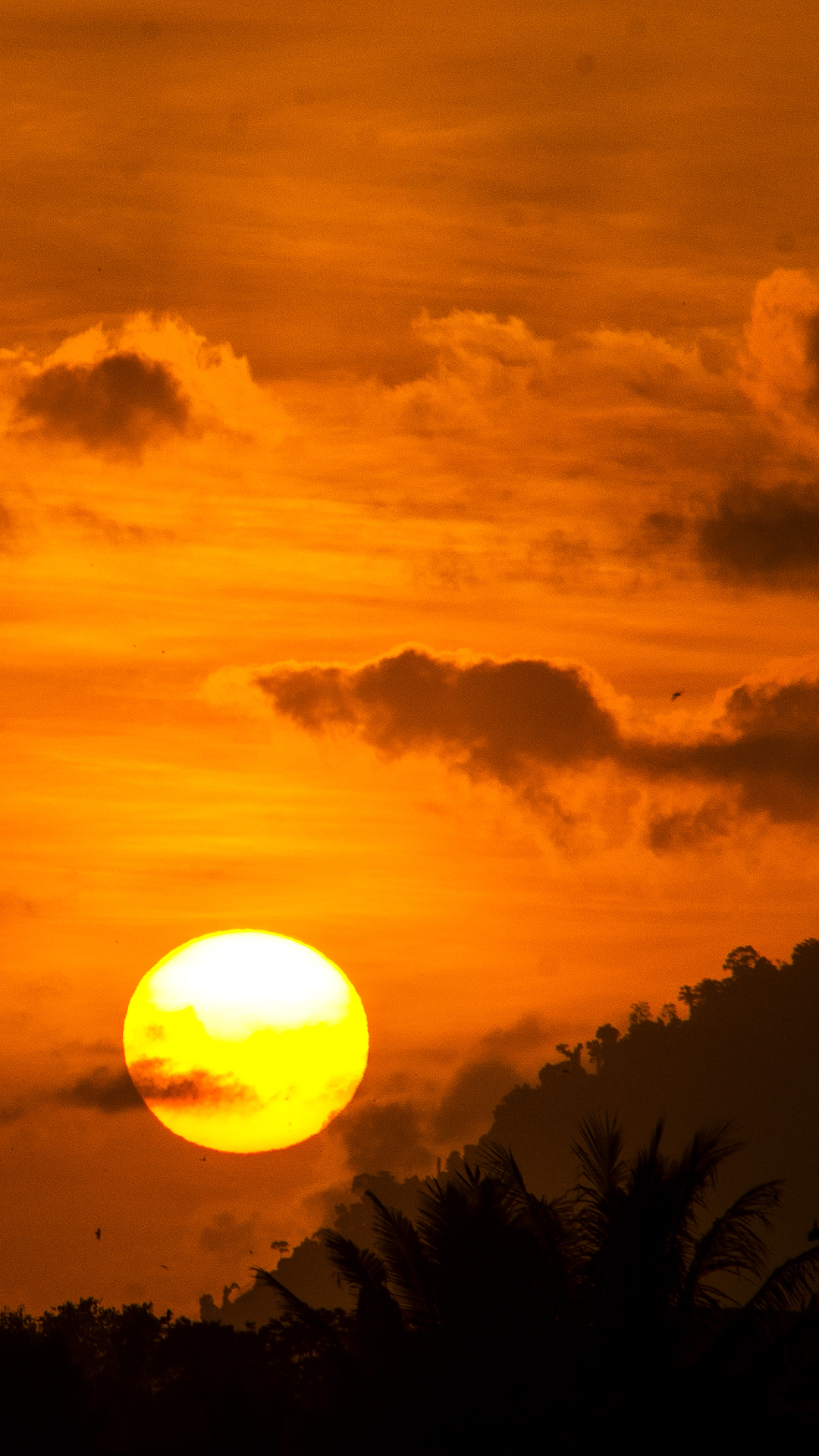 Download mobile wallpaper Sunset, Sun, Earth, Tropics, Indonesia for free.