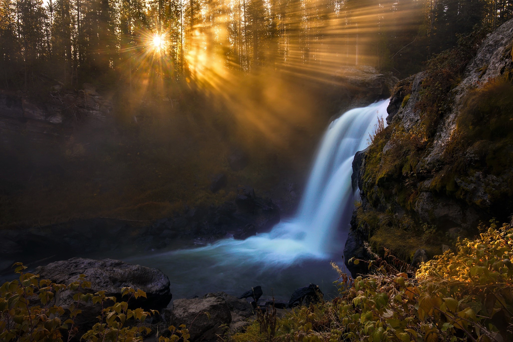 Download mobile wallpaper Nature, Sunset, Waterfalls, Waterfall, Forest, Earth, Sunbeam for free.