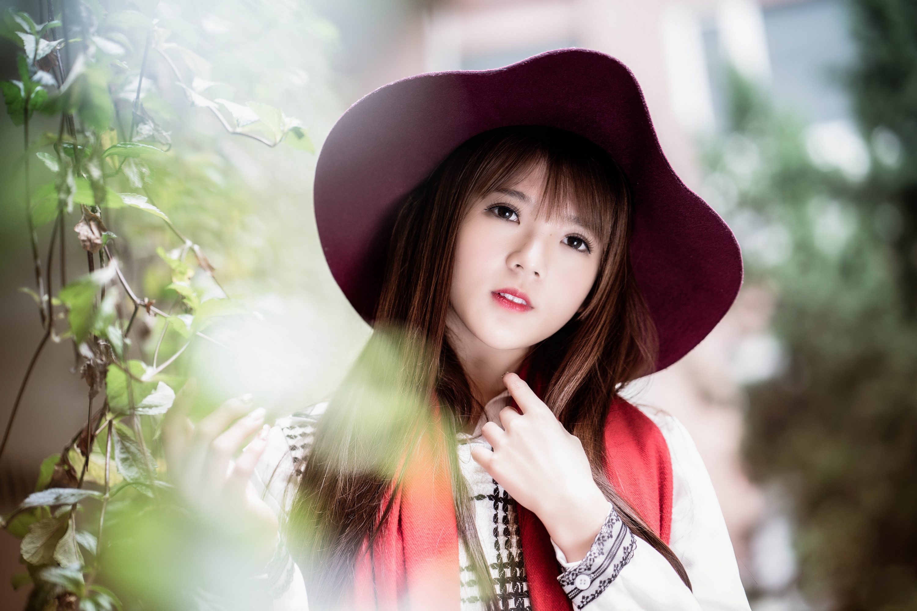 Download mobile wallpaper Blur, Hat, Brunette, Model, Women, Asian, Brown Eyes for free.