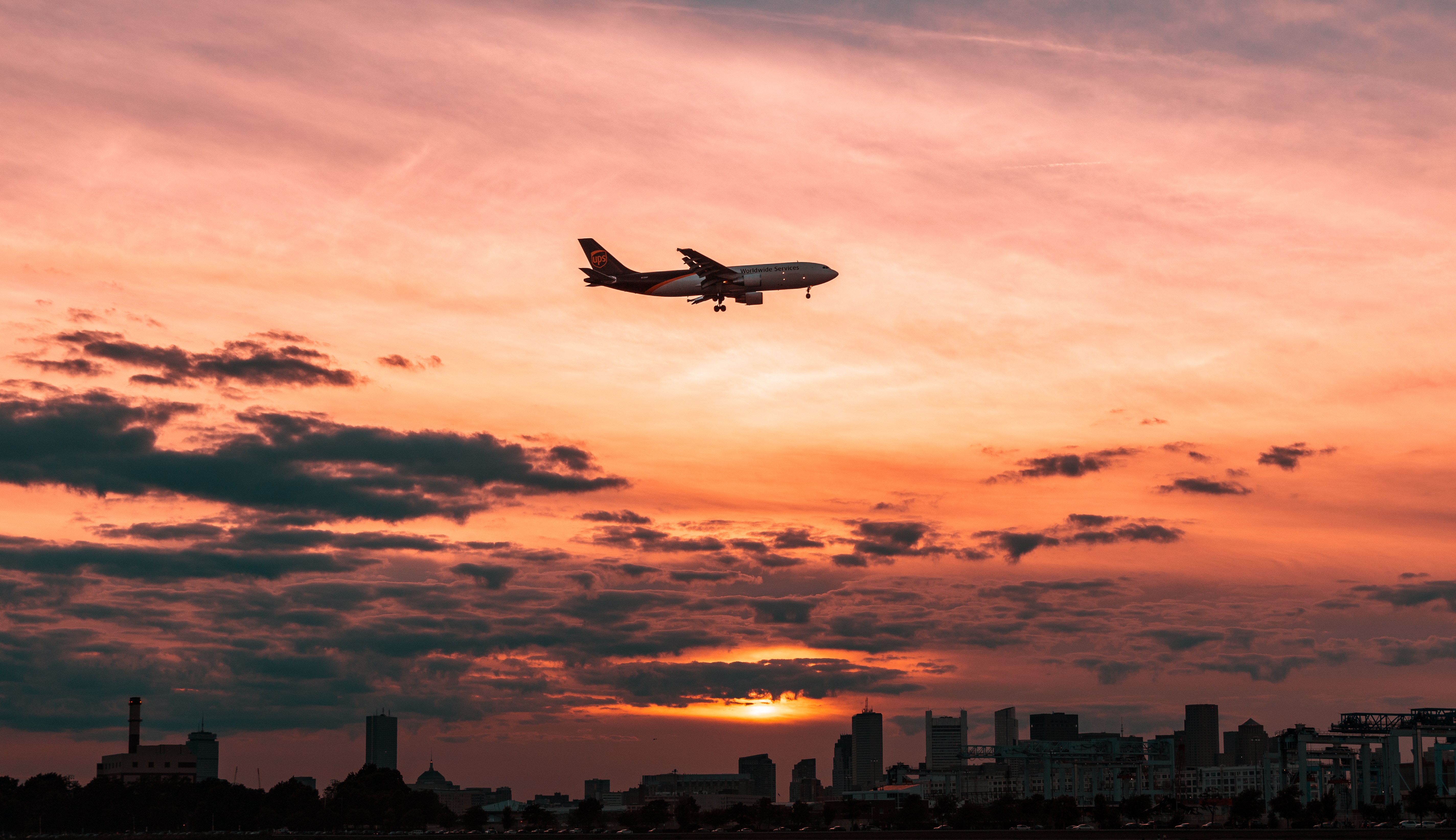 Free download wallpaper Nature, Sunset, Sky, Clouds, Flight, Airplane, Plane on your PC desktop