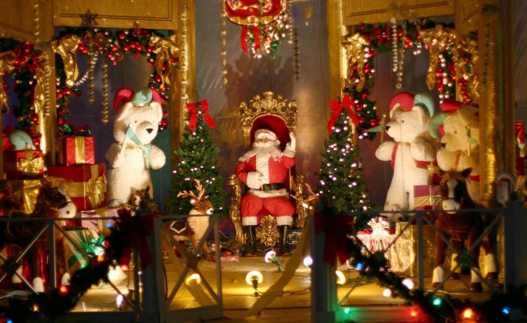 holidays, santa claus, decorations, toys, fir trees, bears, christmas, armchair, fencing, enclosure, presents, gifts