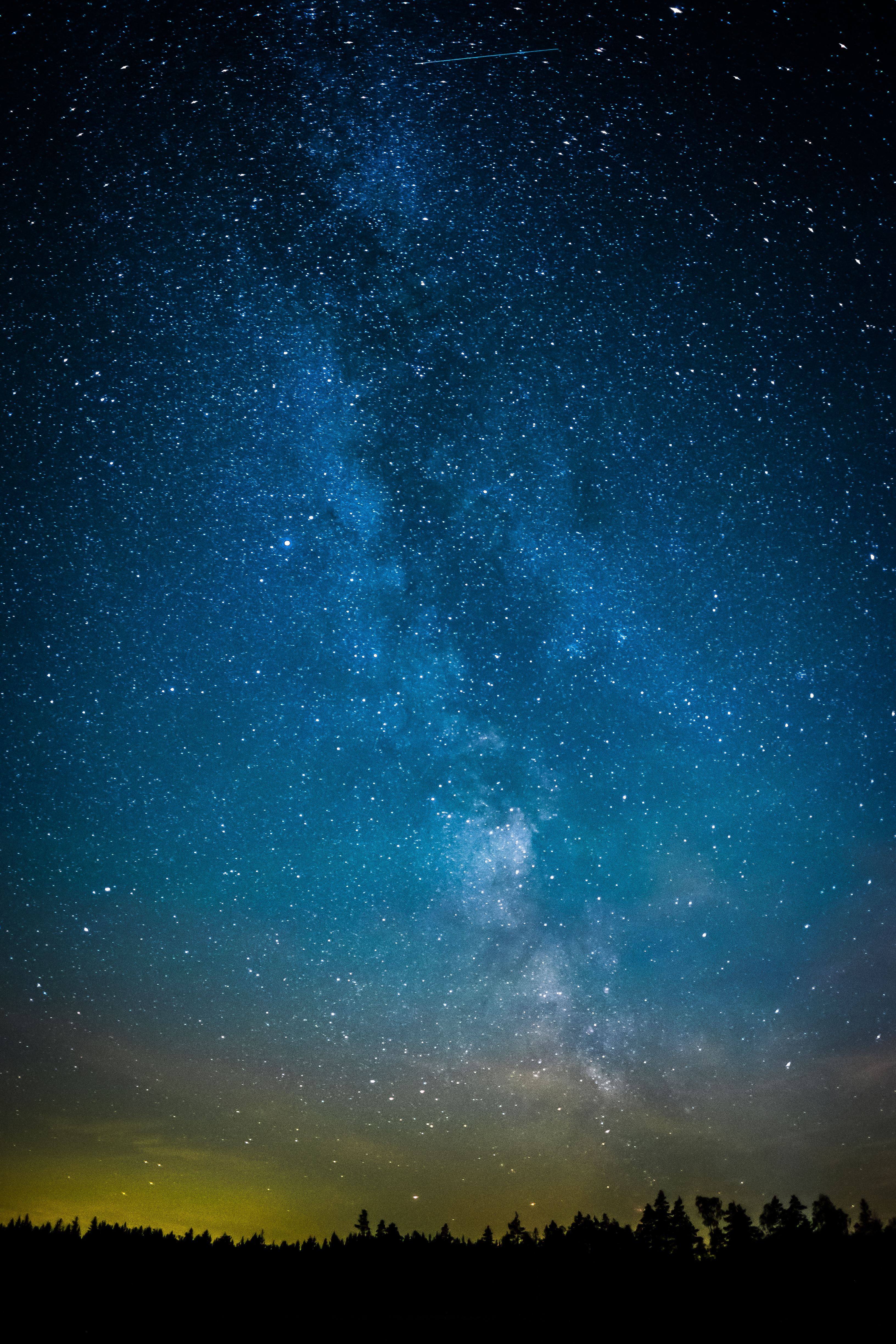 Download mobile wallpaper Trees, Nature, Starry Sky, Glow, Universe for free.
