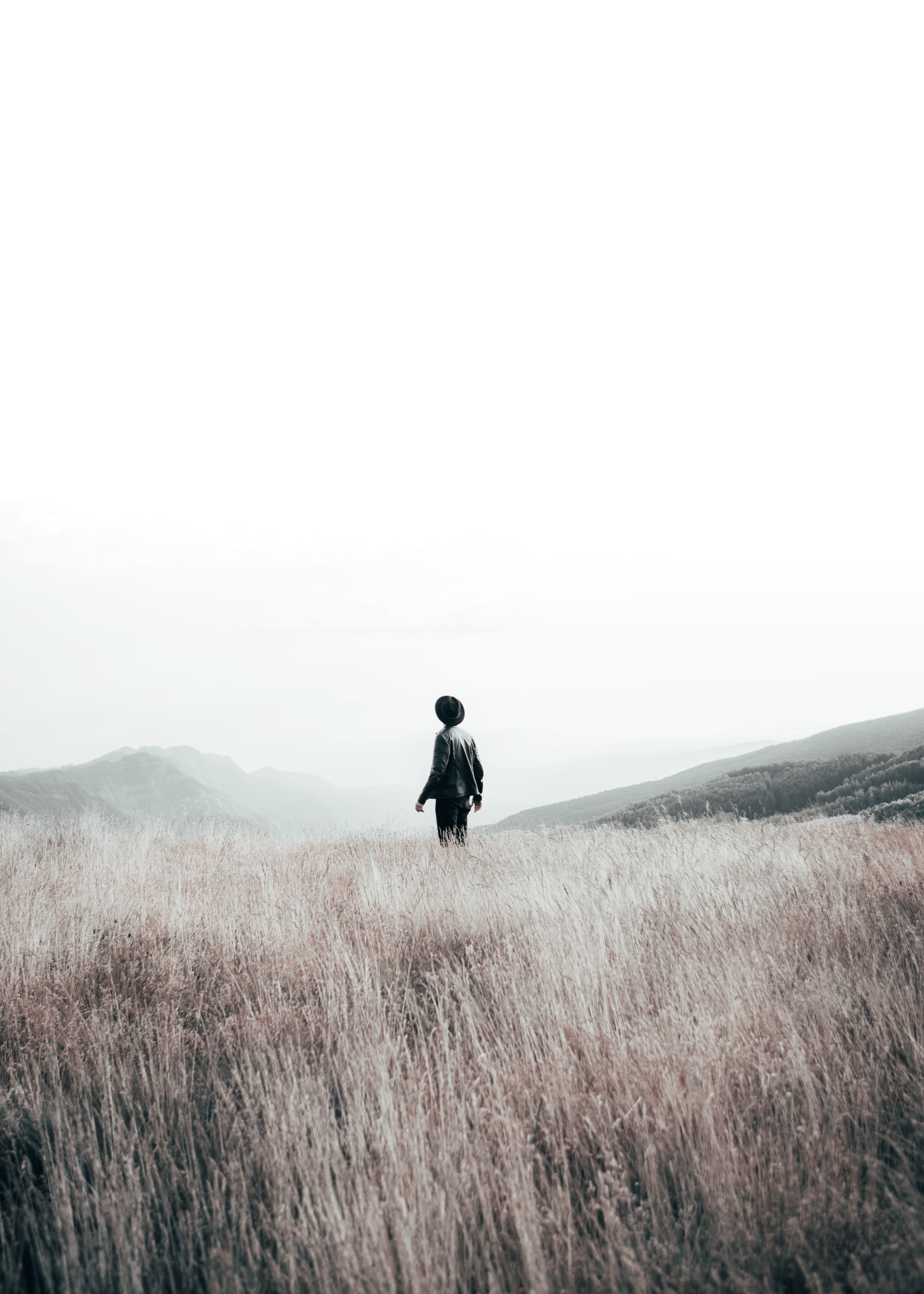 Download mobile wallpaper Field, Hat, Person, Nature, Human, Loneliness for free.