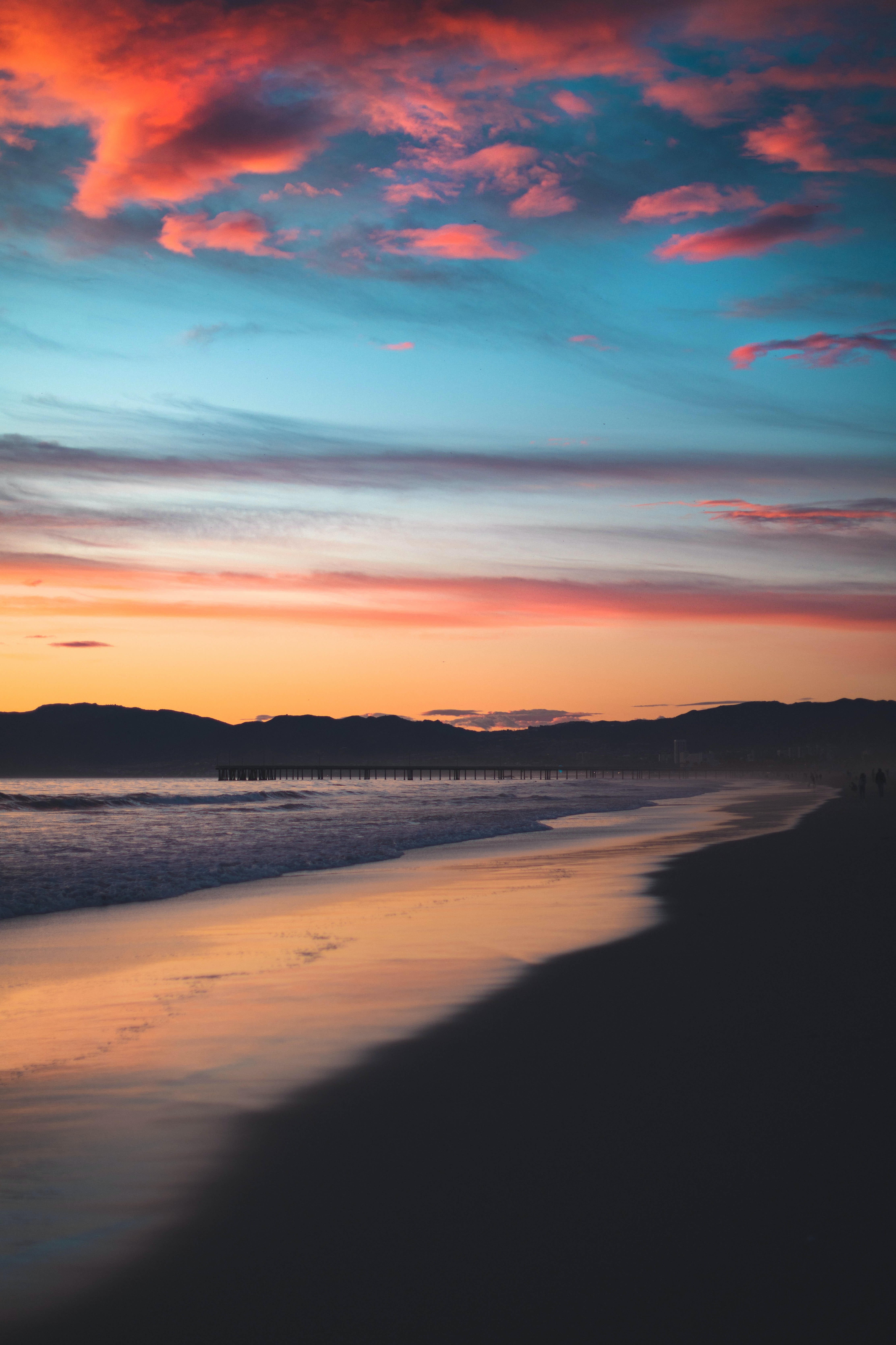 Free download wallpaper Sunset, Mountains, Shore, Bank, Nature, Beach on your PC desktop