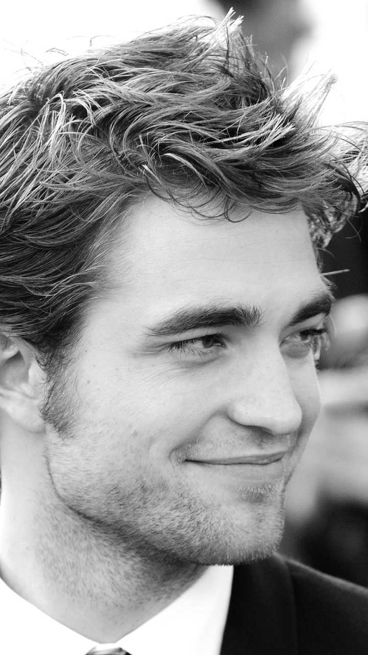 Download mobile wallpaper Robert Pattinson, Smile, Face, Celebrity, Black & White, Actor for free.