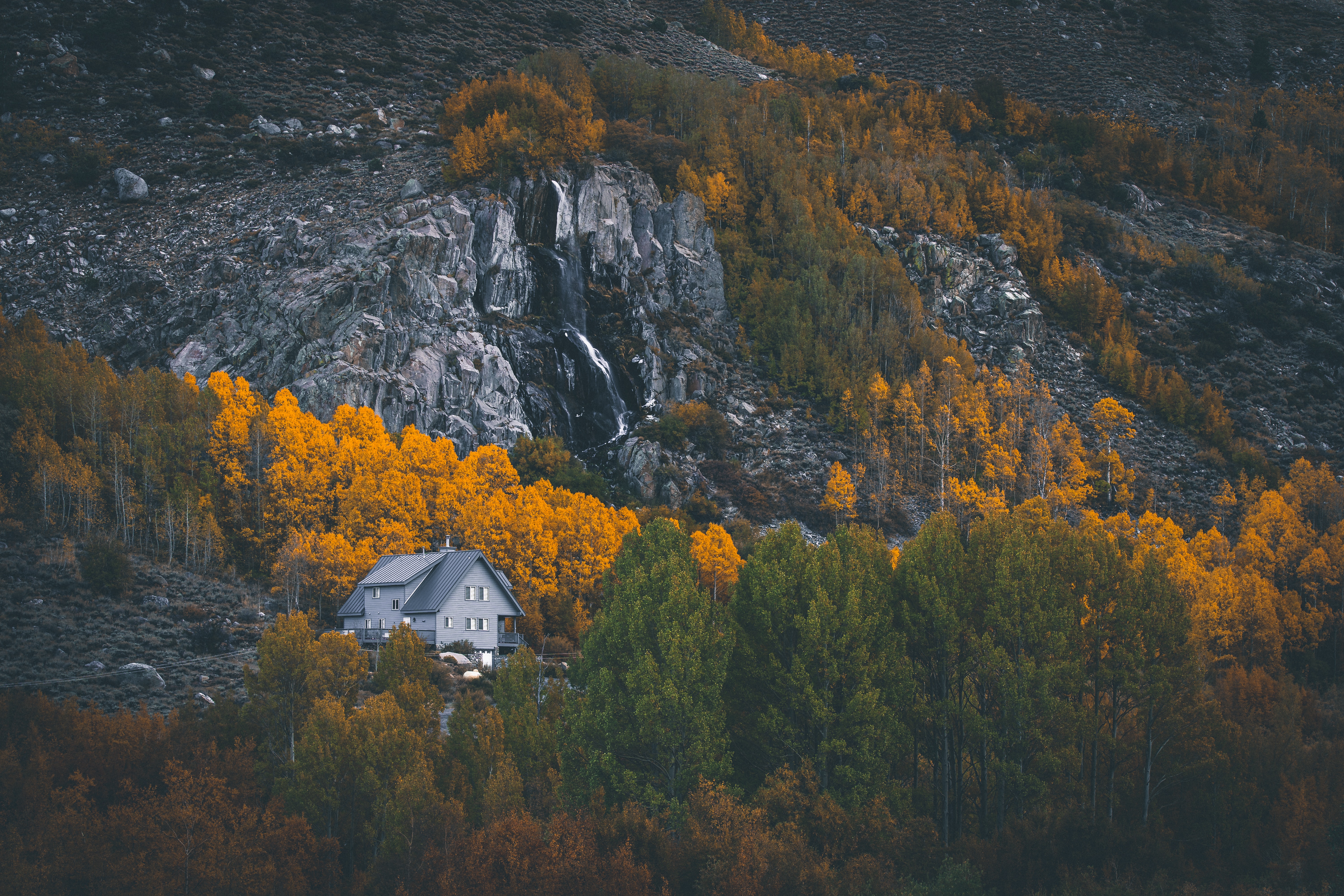 Download mobile wallpaper Trees, Rocks, Forest, Nature, Mountains, House for free.