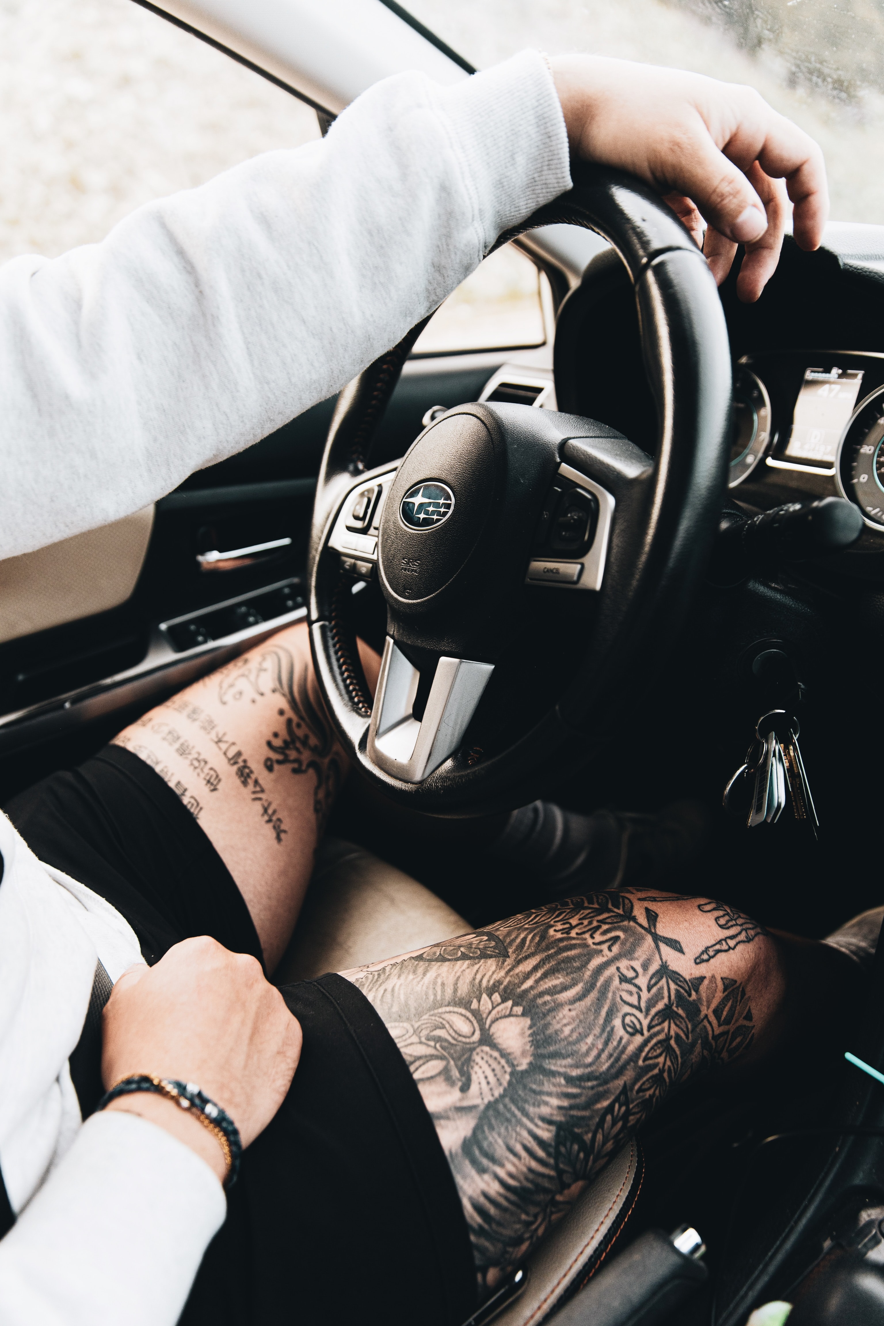 tattoo, steering wheel, subaru, cars, car, machine, human, person, rudder, salon