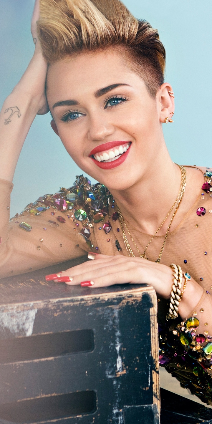 Download mobile wallpaper Music, Jewelry, Smile, Singer, Blonde, Blue Eyes, American, Miley Cyrus for free.