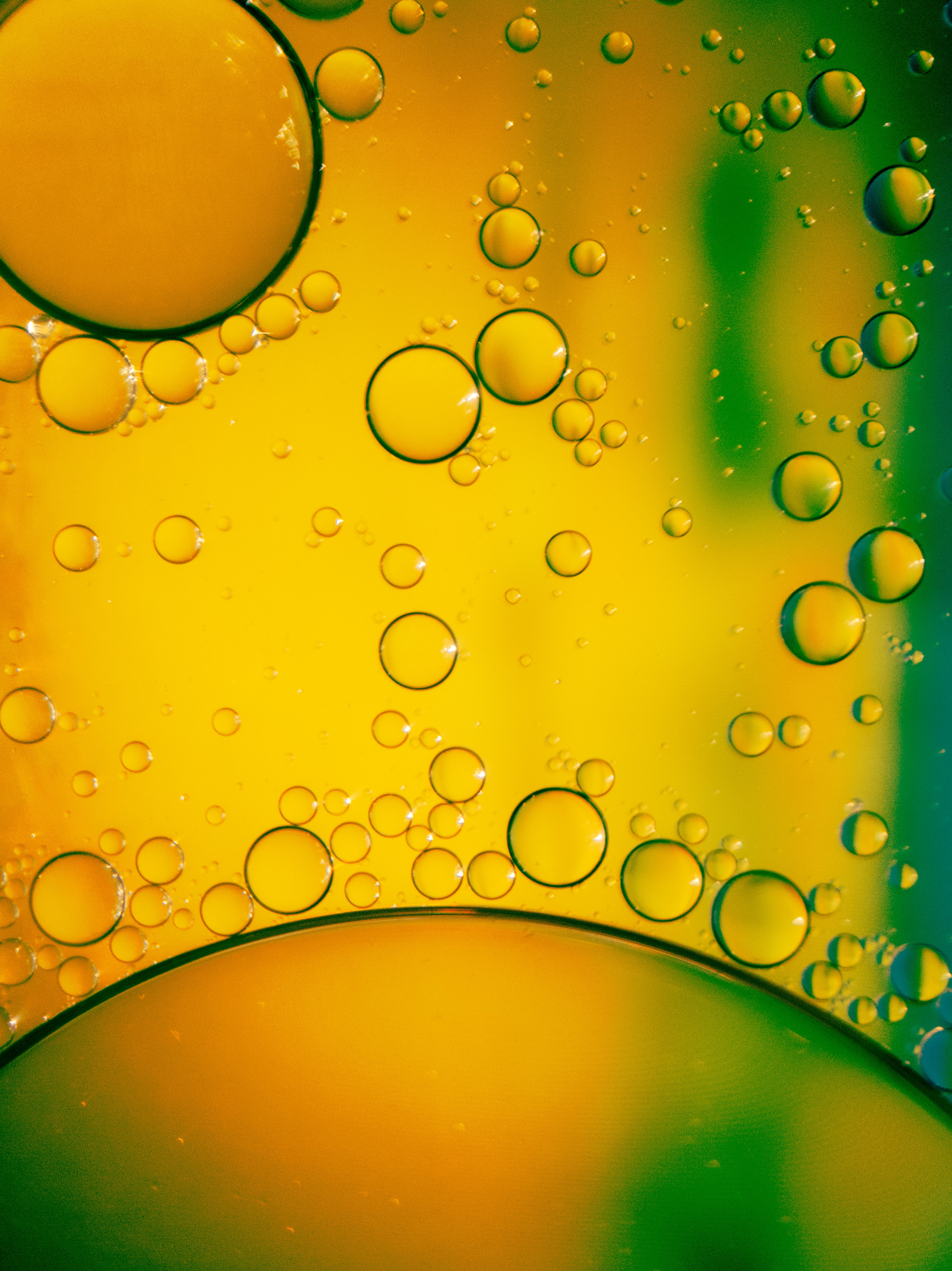 Скачать картинку Зеленый, Желтый, Макро, Пузыри, Жидкость в телефон бесплатно.
