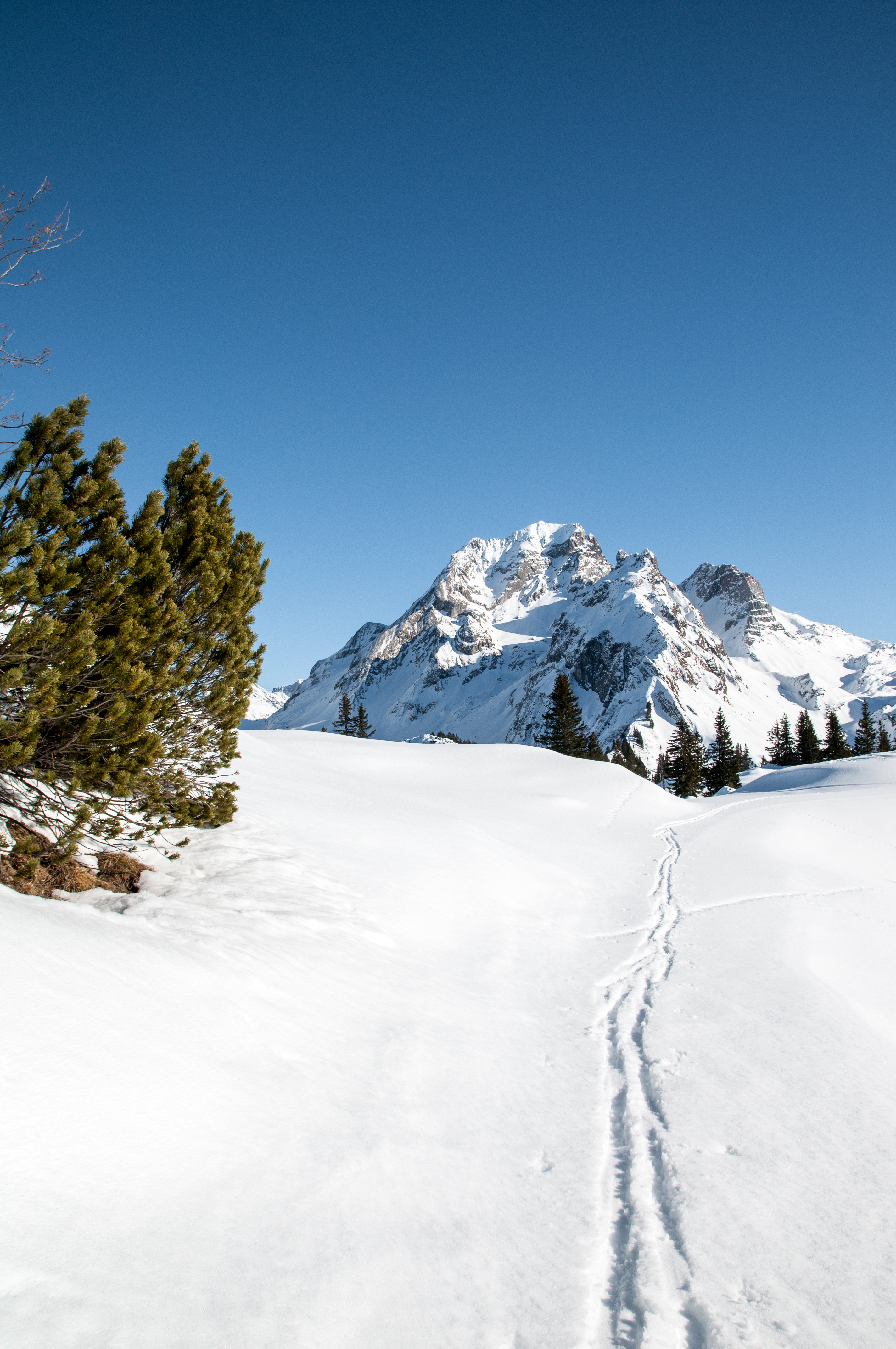 Download mobile wallpaper Winter, Traces, Snow, Mountain, Path, Landscape, Nature for free.