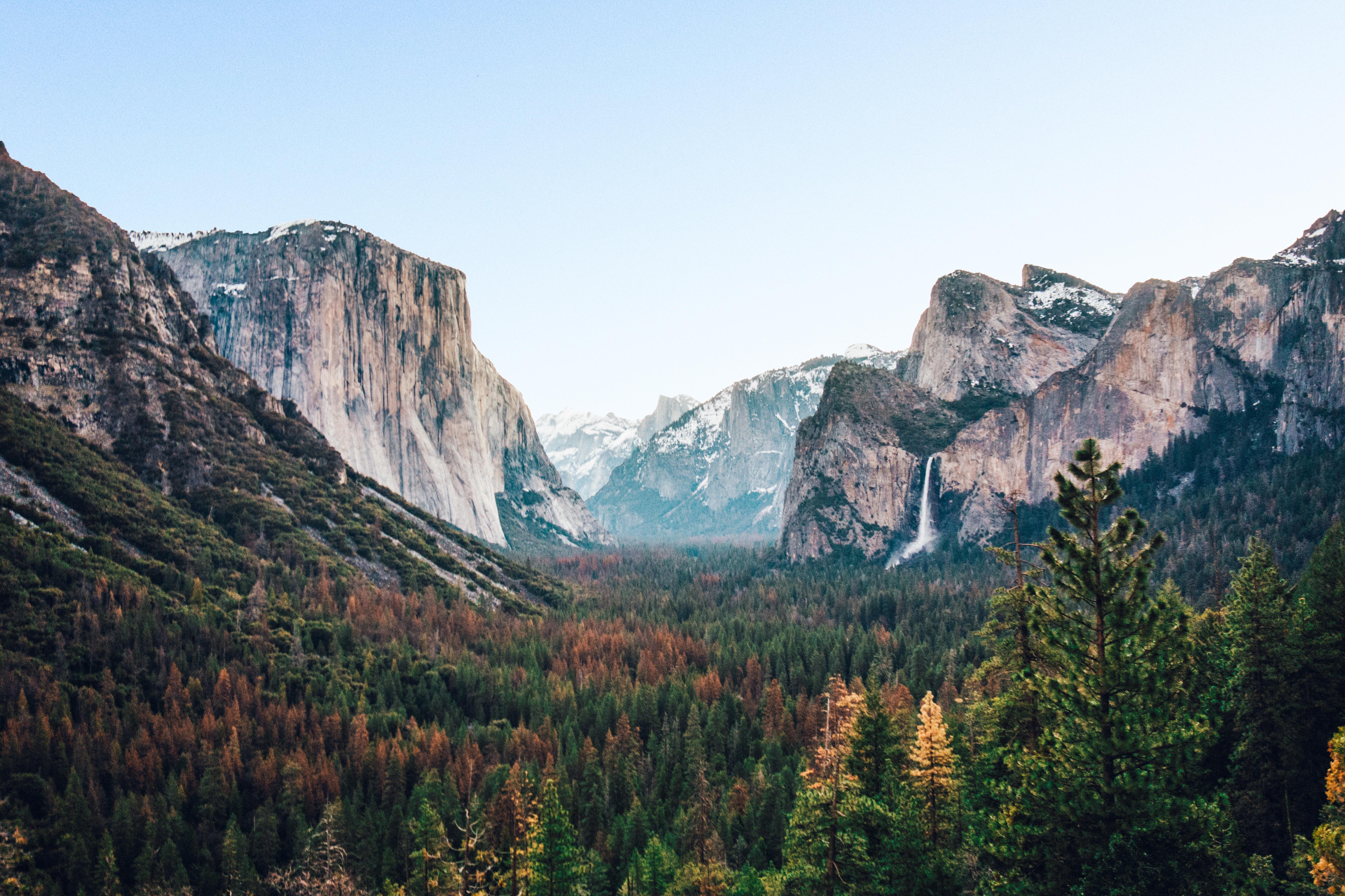 Download mobile wallpaper Landscape, Nature, Mountain, Waterfall, Forest, Earth, Cliff, Yosemite National Park for free.