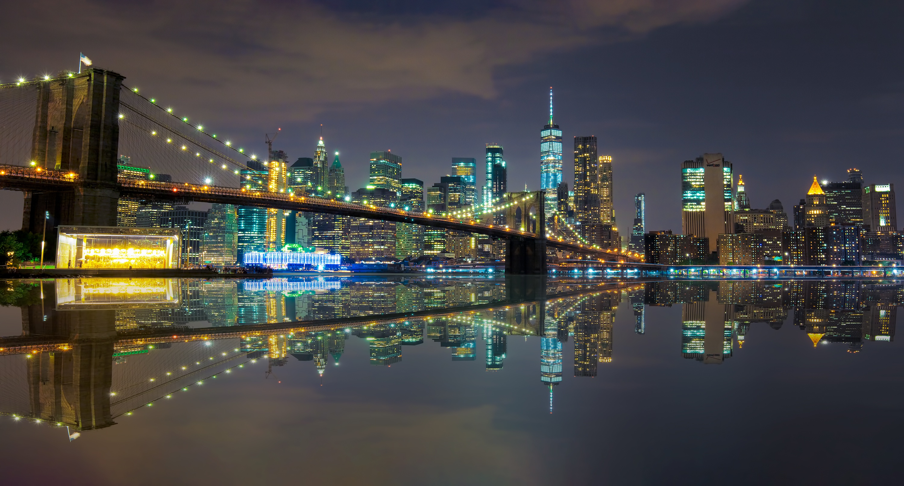 Download mobile wallpaper Cities, Night, Usa, Skyscraper, Building, Reflection, Bridge, New York, Man Made for free.