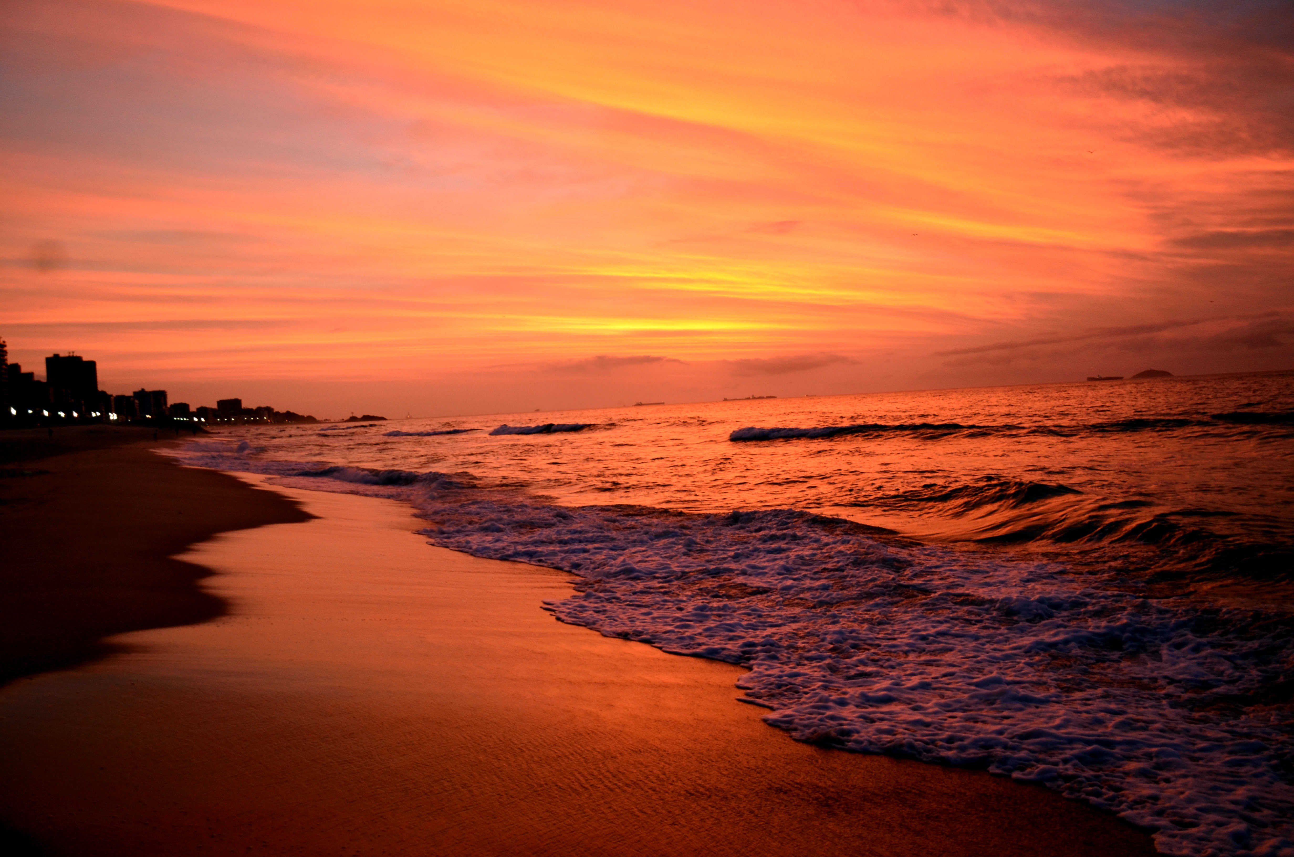 Download mobile wallpaper Sunset, Sky, Sea, Beach, Horizon, Ocean, Earth, Coastline, Orange (Color) for free.