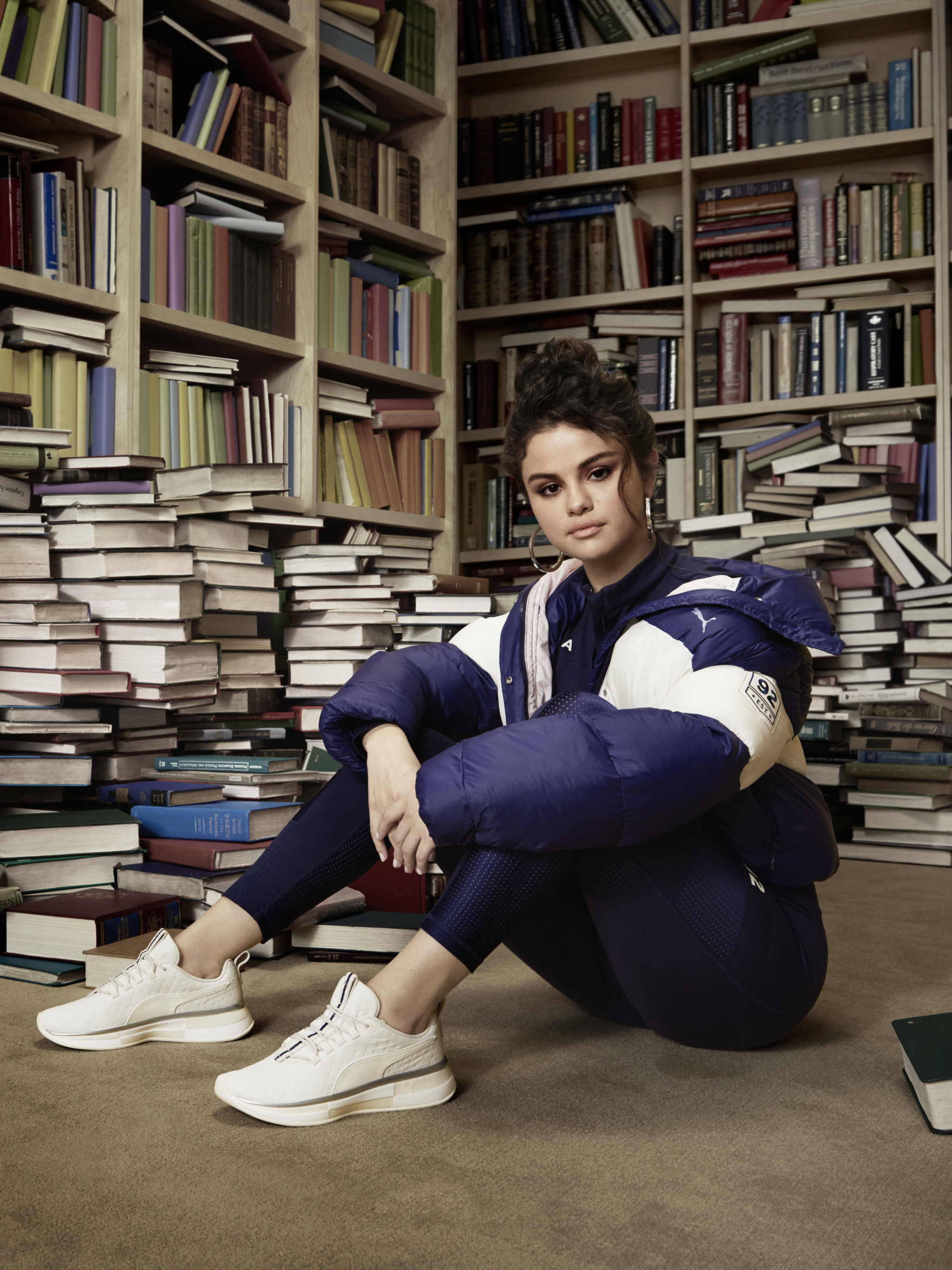 Download mobile wallpaper Music, Selena Gomez, Book, Singer, Brunette, Library, American, Shoe for free.