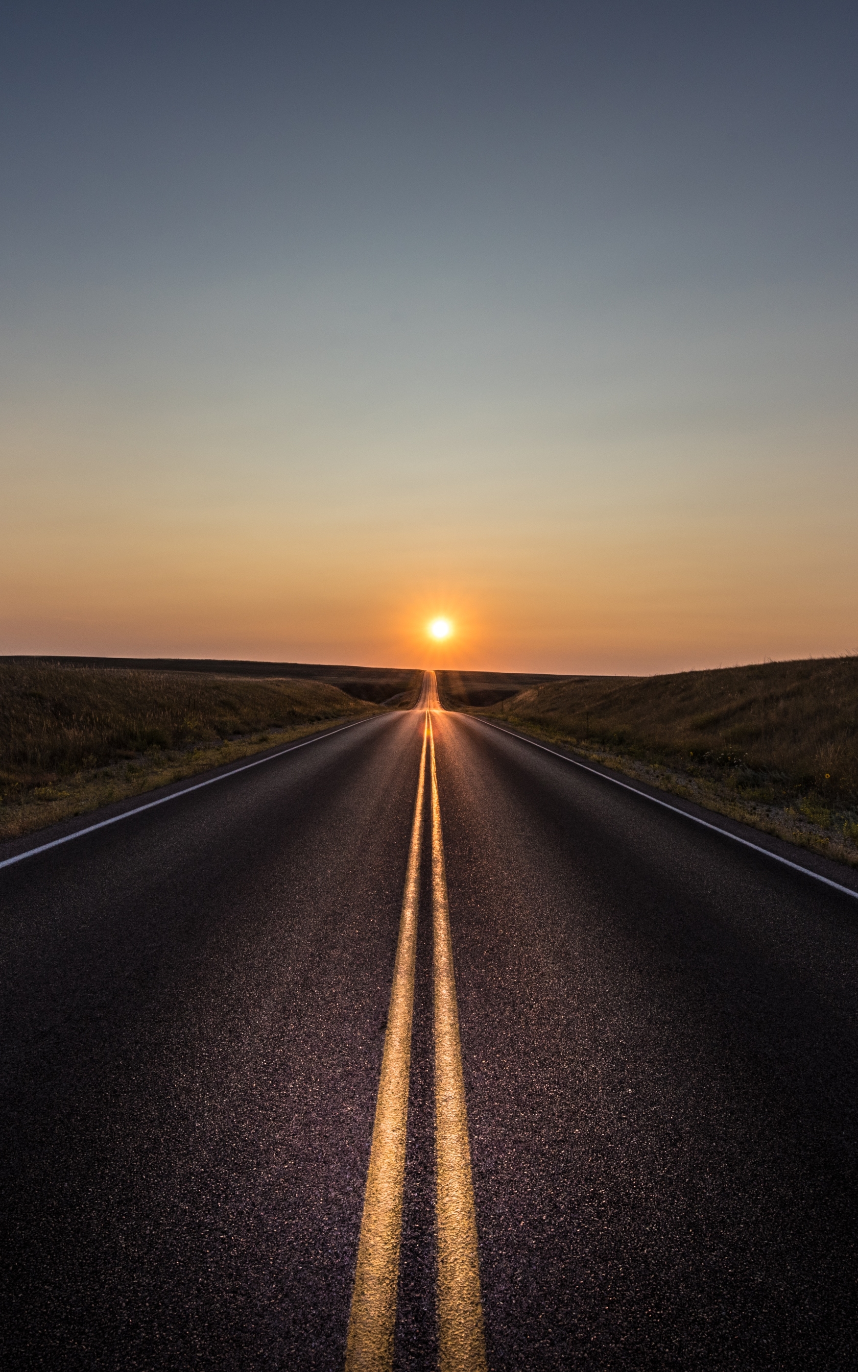 Download mobile wallpaper Sunset, Road, Man Made for free.