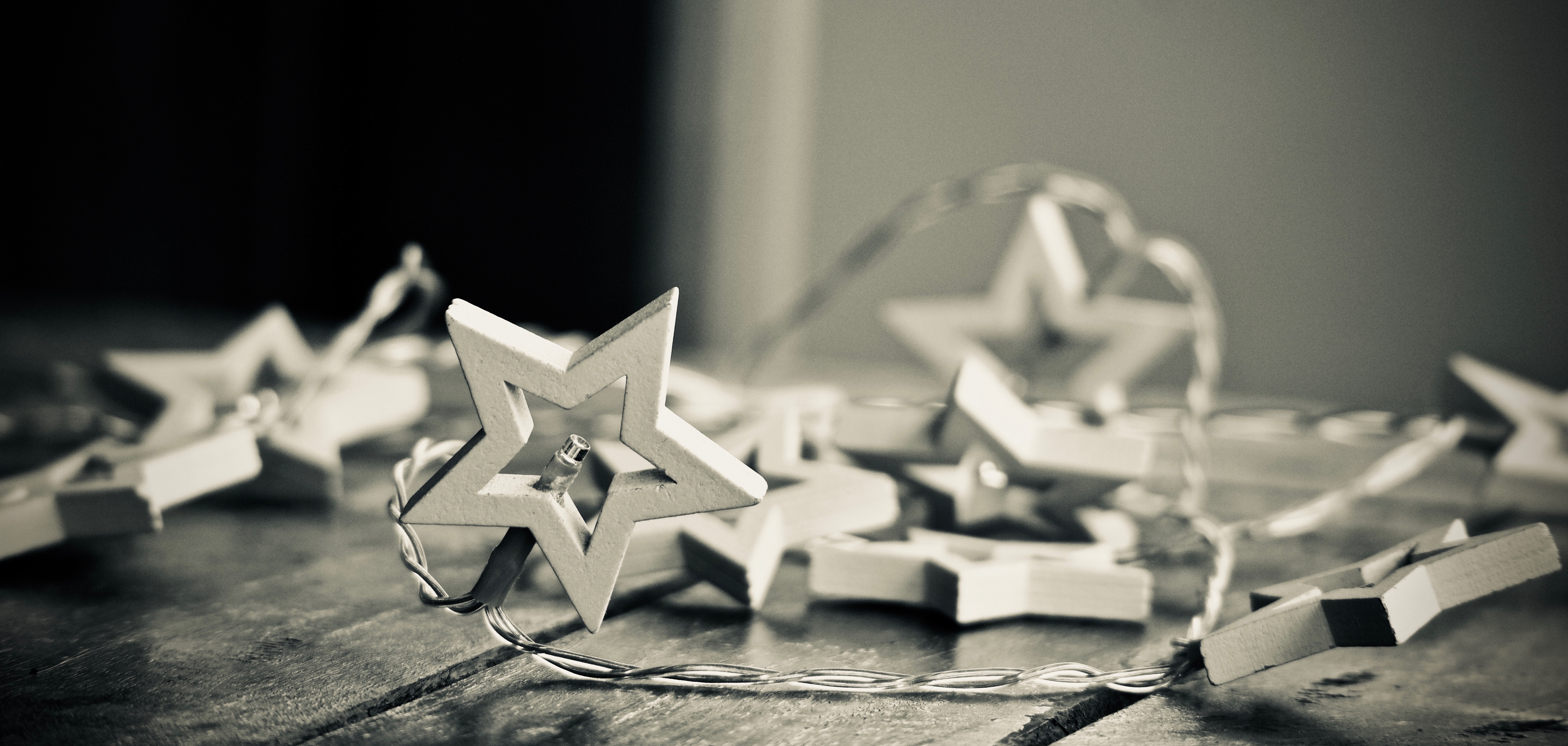 Download mobile wallpaper Stars, Wood, Christmas, Holiday, Black & White, Christmas Ornaments, Ligths for free.