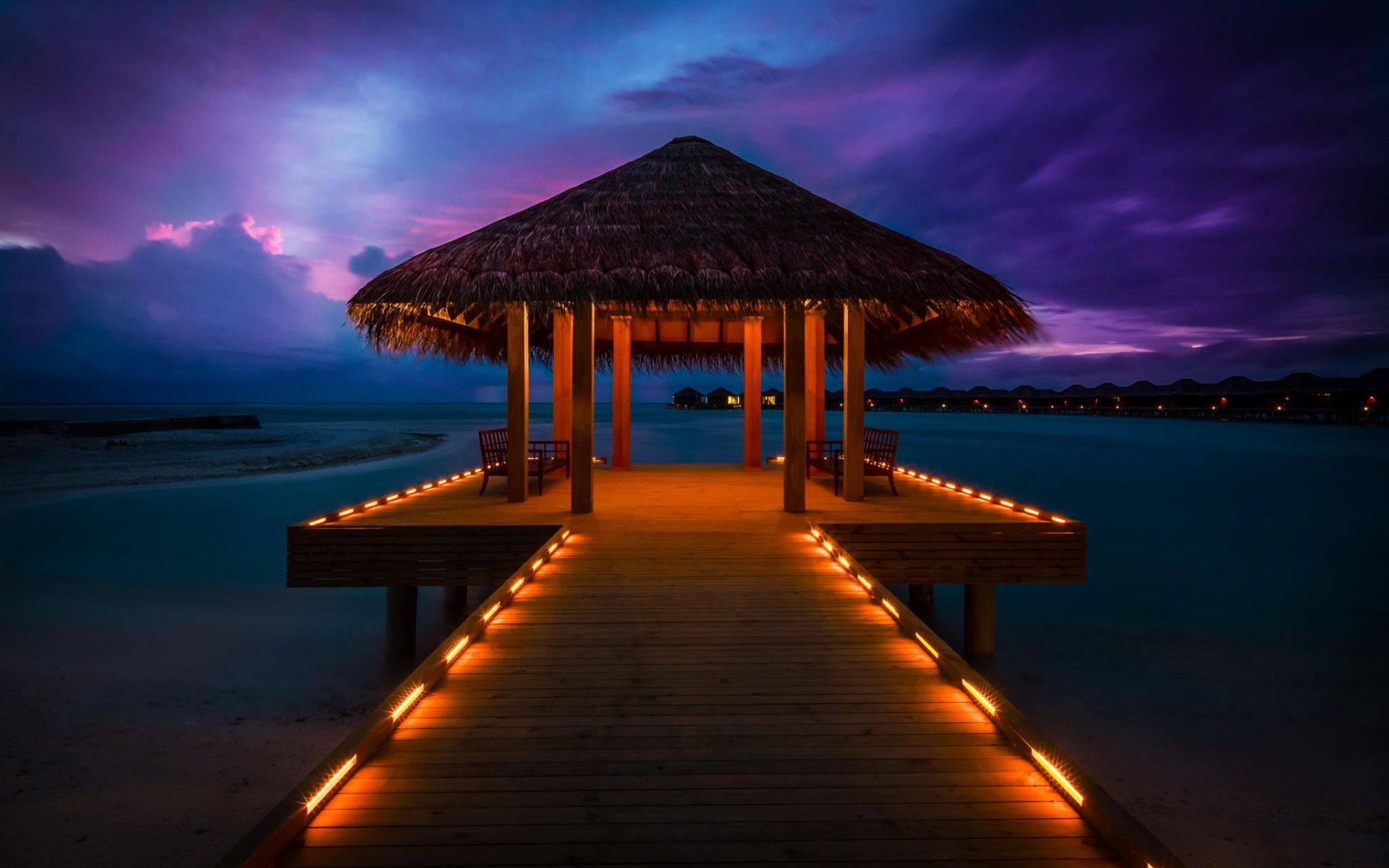 Download mobile wallpaper Night, Pier, Holiday, Tropical, Hut, Photography, Maldives, Man Made for free.
