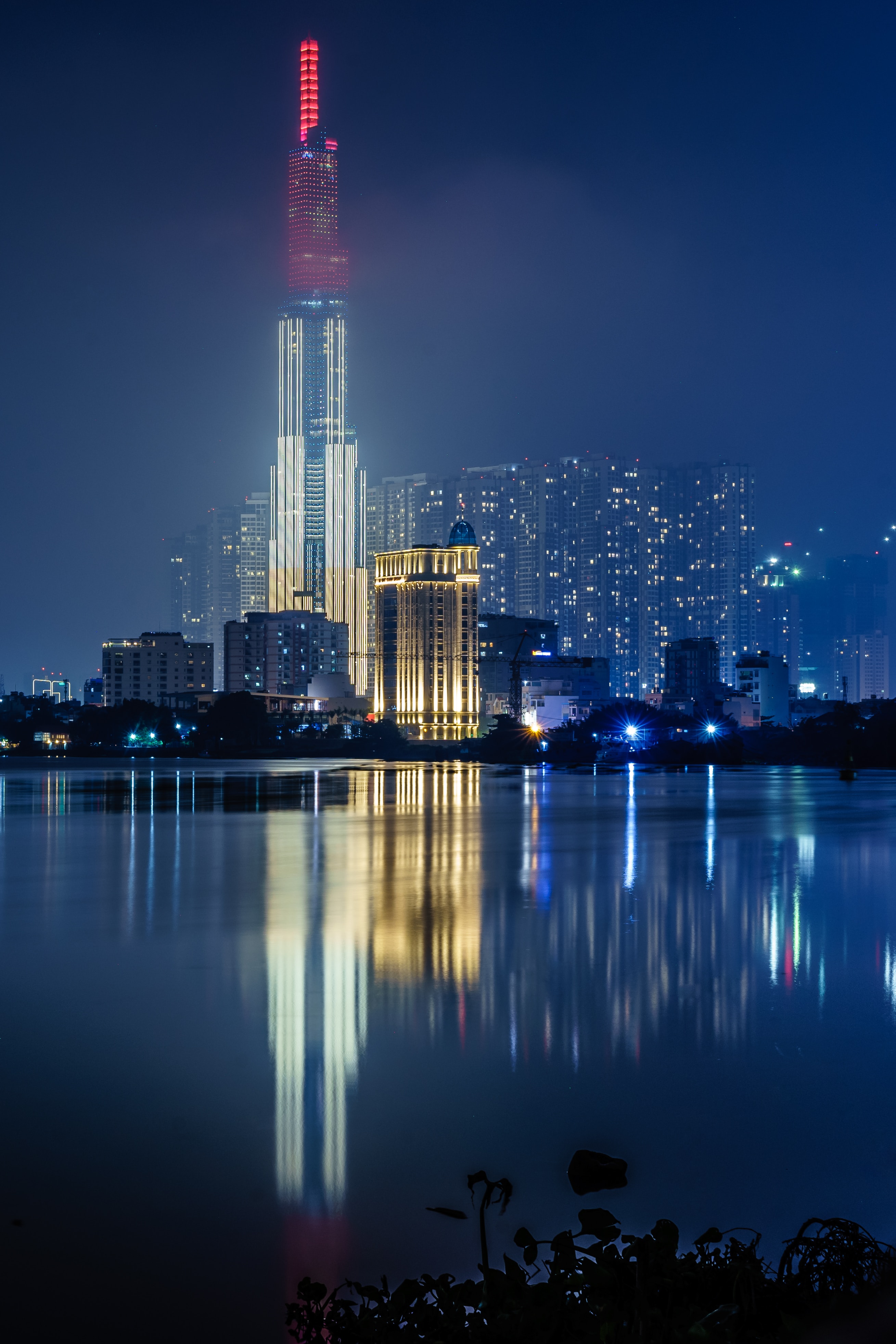 Download mobile wallpaper Reflection, Cities, Night City, Water, Architecture, Building for free.