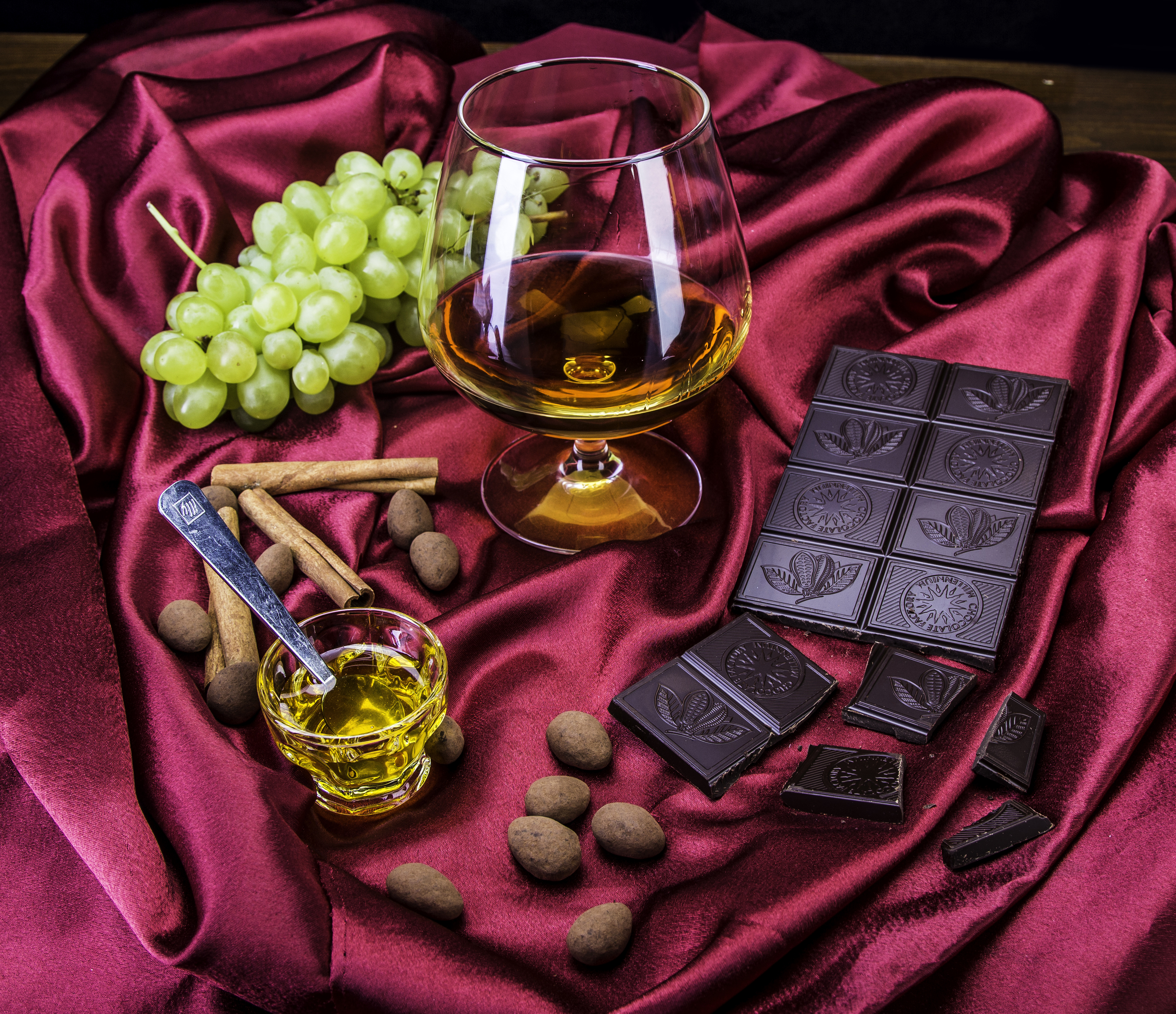 Download mobile wallpaper Food, Chocolate, Grapes, Still Life, Cinnamon, Glass, Drink, Alcohol for free.