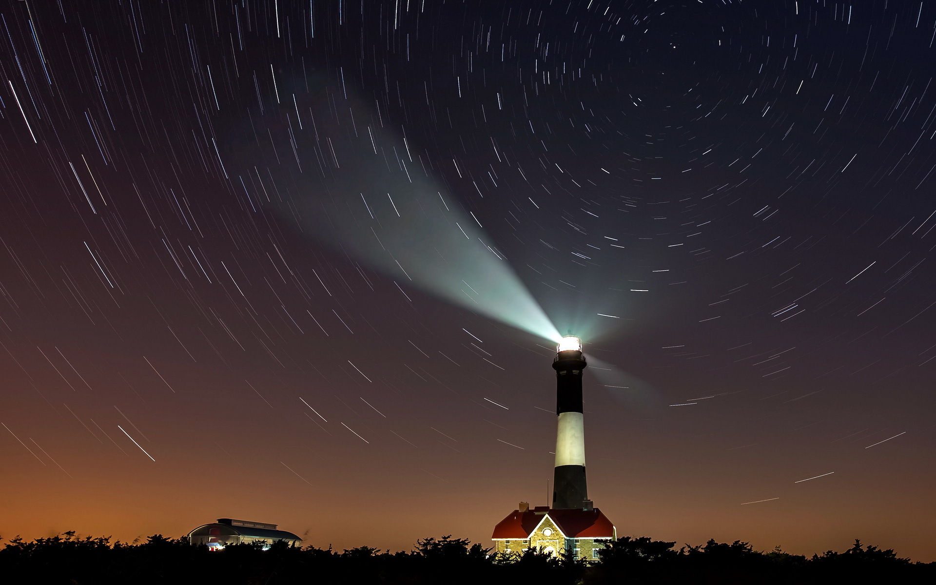Download mobile wallpaper Sky, Stars, Night, Architecture, Light, Lighthouse, Man Made, Time Lapse for free.