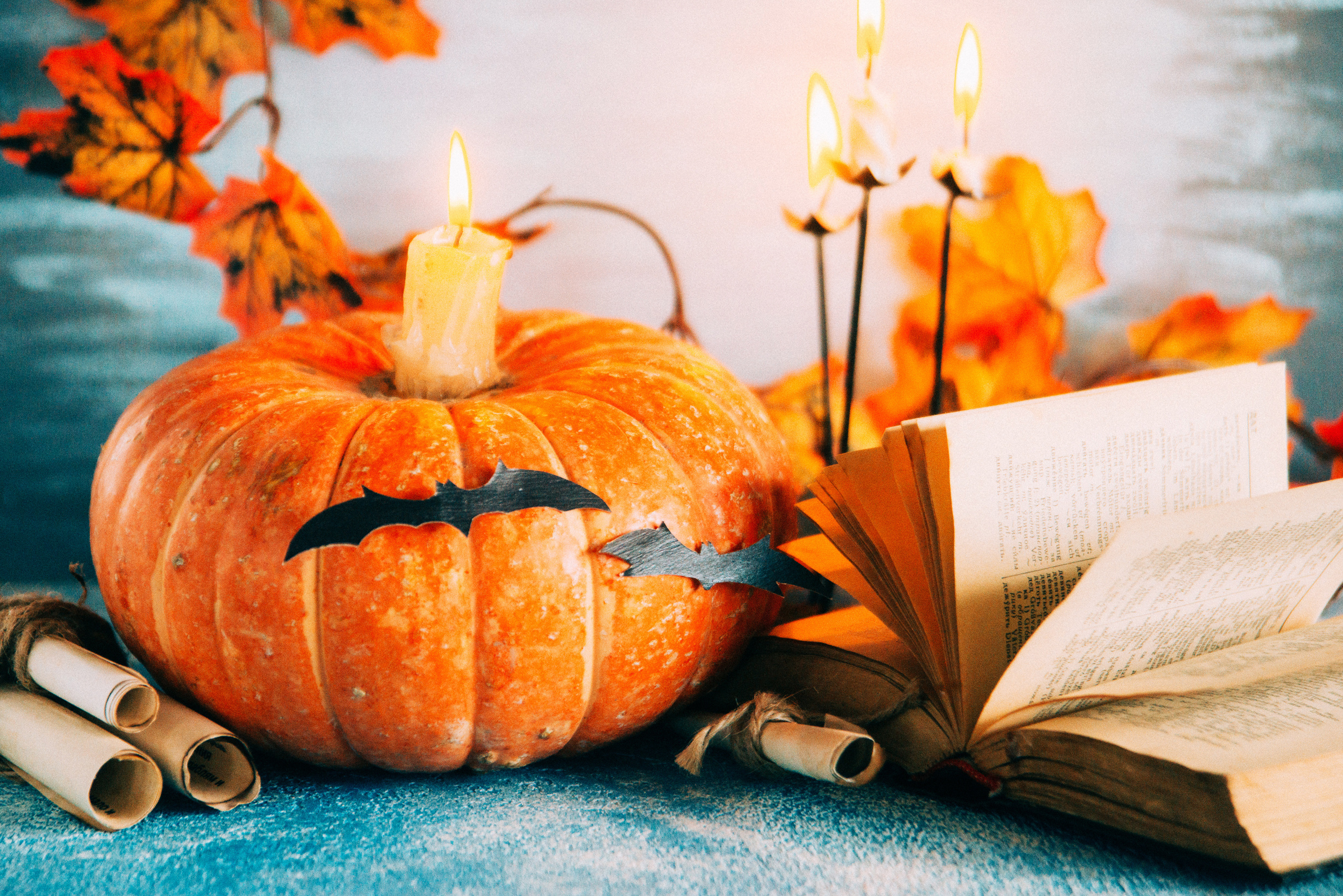 Download mobile wallpaper Halloween, Pumpkin, Holiday, Book, Candle for free.