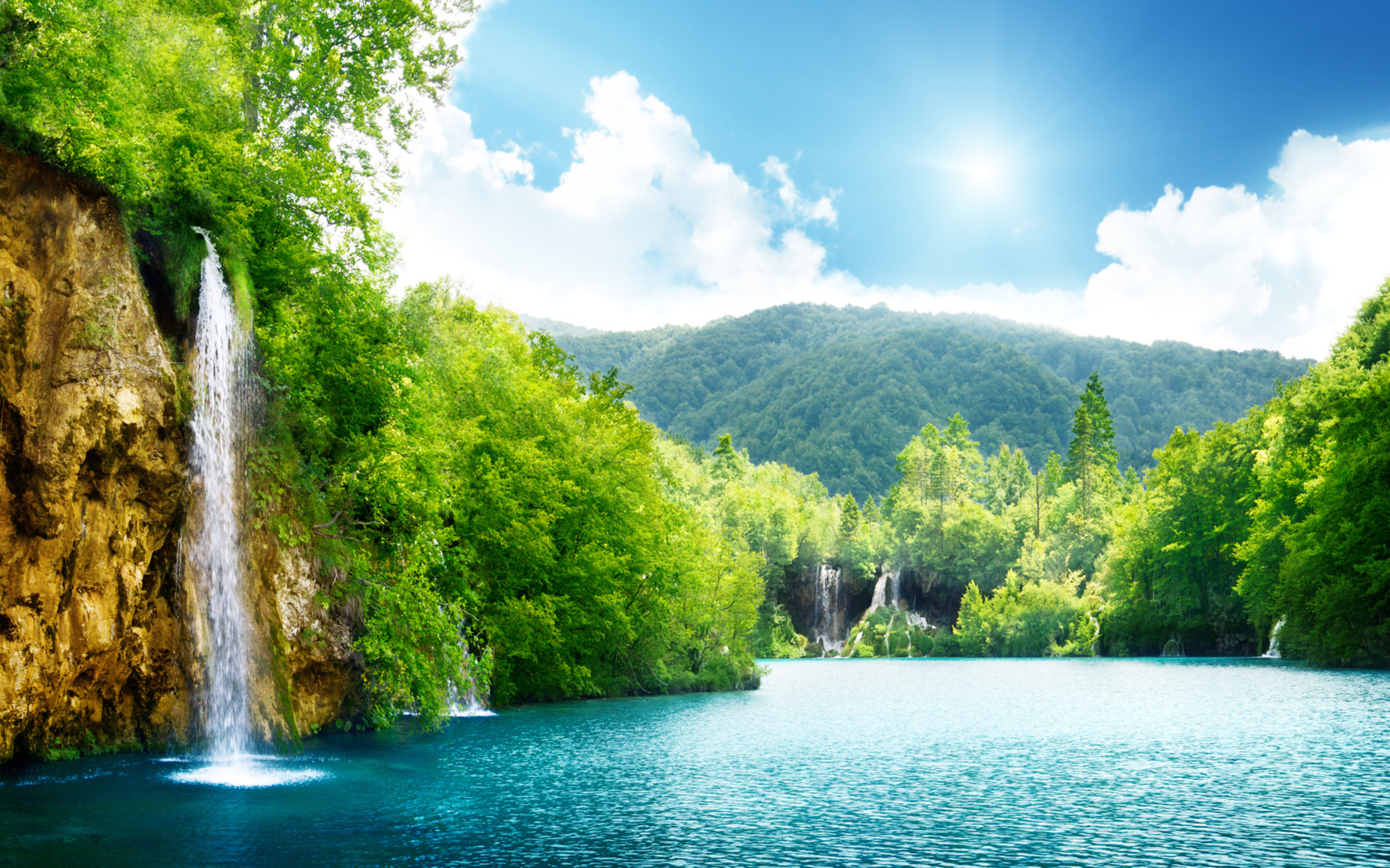 Download mobile wallpaper Lake, Waterfall, Waterfalls, Earth for free.
