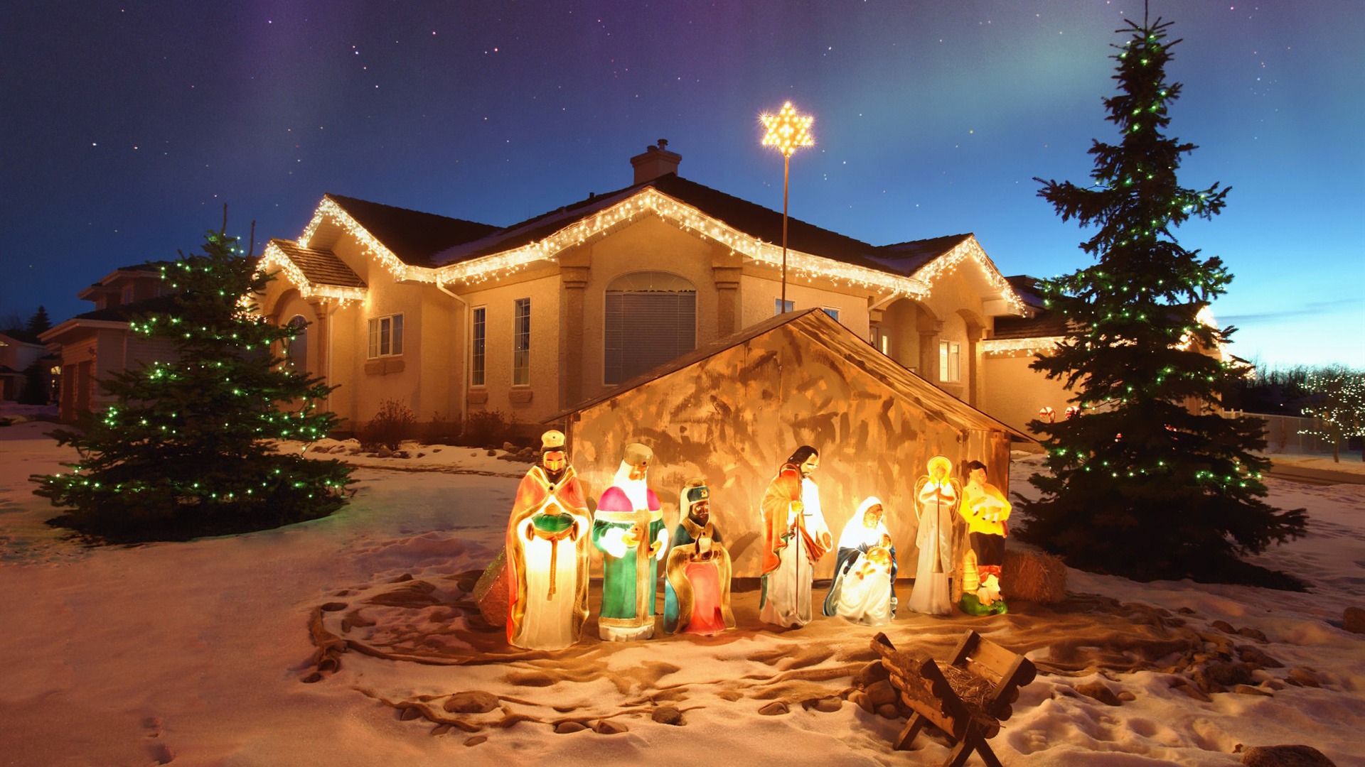 1004862 Bild herunterladen schnee, feiertage, weihnachten, weihnachtsbeleuchtung, haus, geburt, stern, baum - Hintergrundbilder und Bildschirmschoner kostenlos